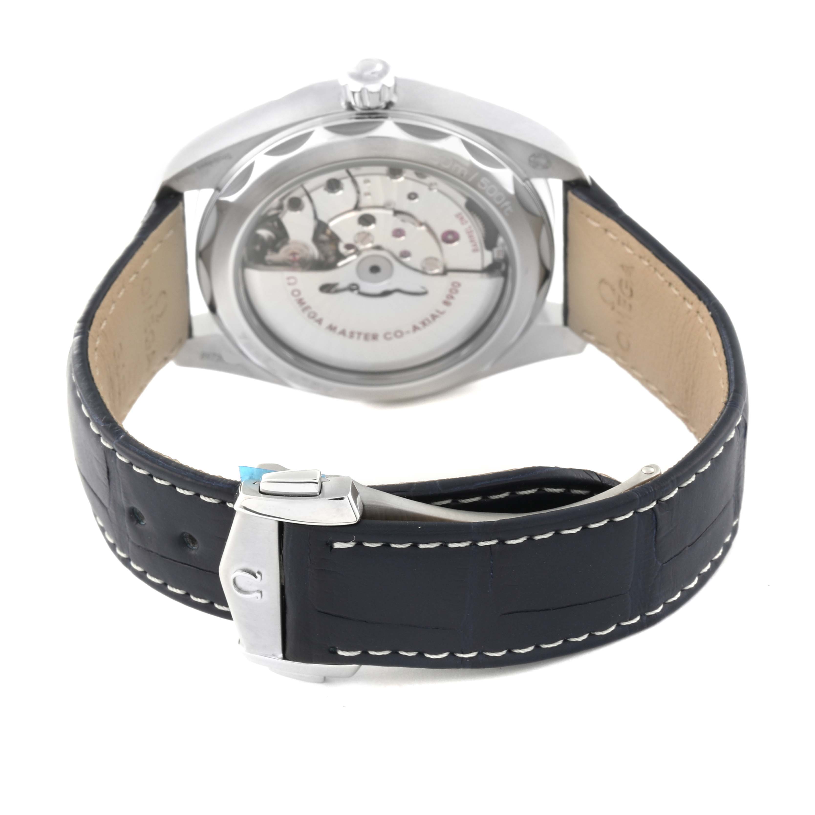 The image shows the back view of an Omega Aqua Terra 220.13.41.21.03.002 Men's Stainless Steel Blue Dial 220.13.41.21.03.002 Men's Stainless Steel Blue Dial watch, highlighting its open case back and blue leather strap with a clasp.