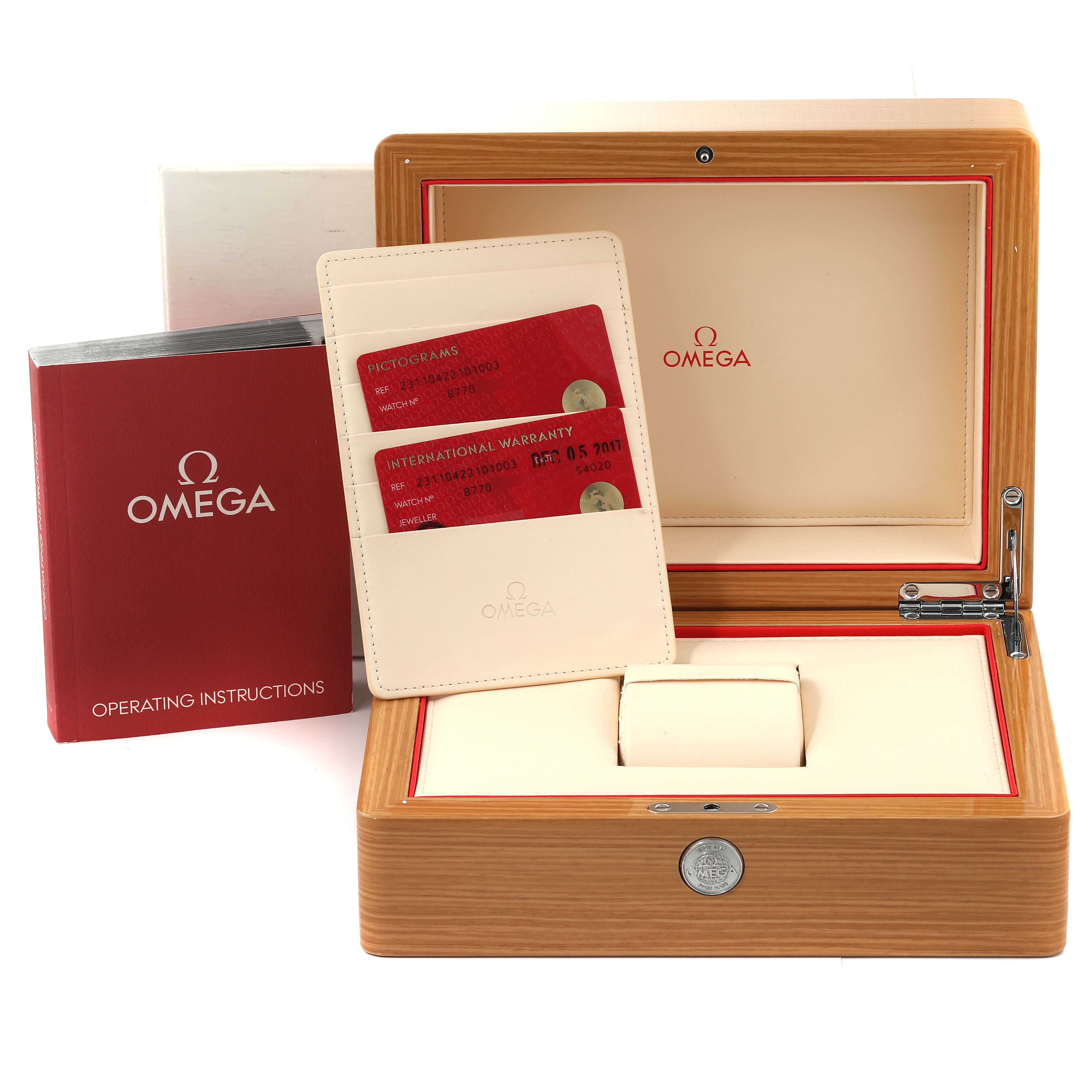 The image shows the packaging and accessories for the Omega Aqua Terra 231.10.42.21.01.003 Men
s Stainless Steel Black Dial 231.10.42.21.01.003 Men
s Stainless Steel Black Dial, including the box, operating instructions, and warranty cards.