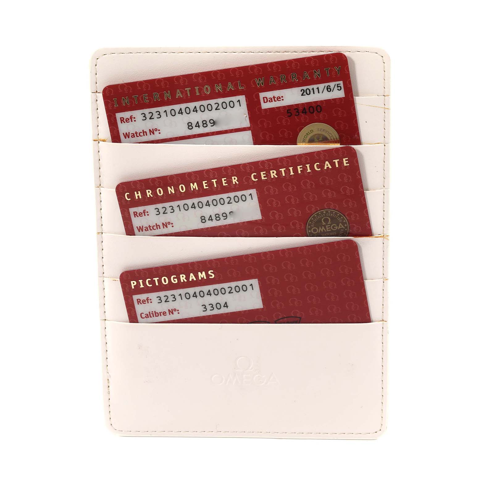 The image shows warranty, chronometer certificate, and pictograms cards for an Omega Speedmaster 323.10.40.40.02.001 Men
s Stainless Steel Silver Dial 323.10.40.40.02.001 Men
s Stainless Steel Silver Dial watch, in a white cardholder.