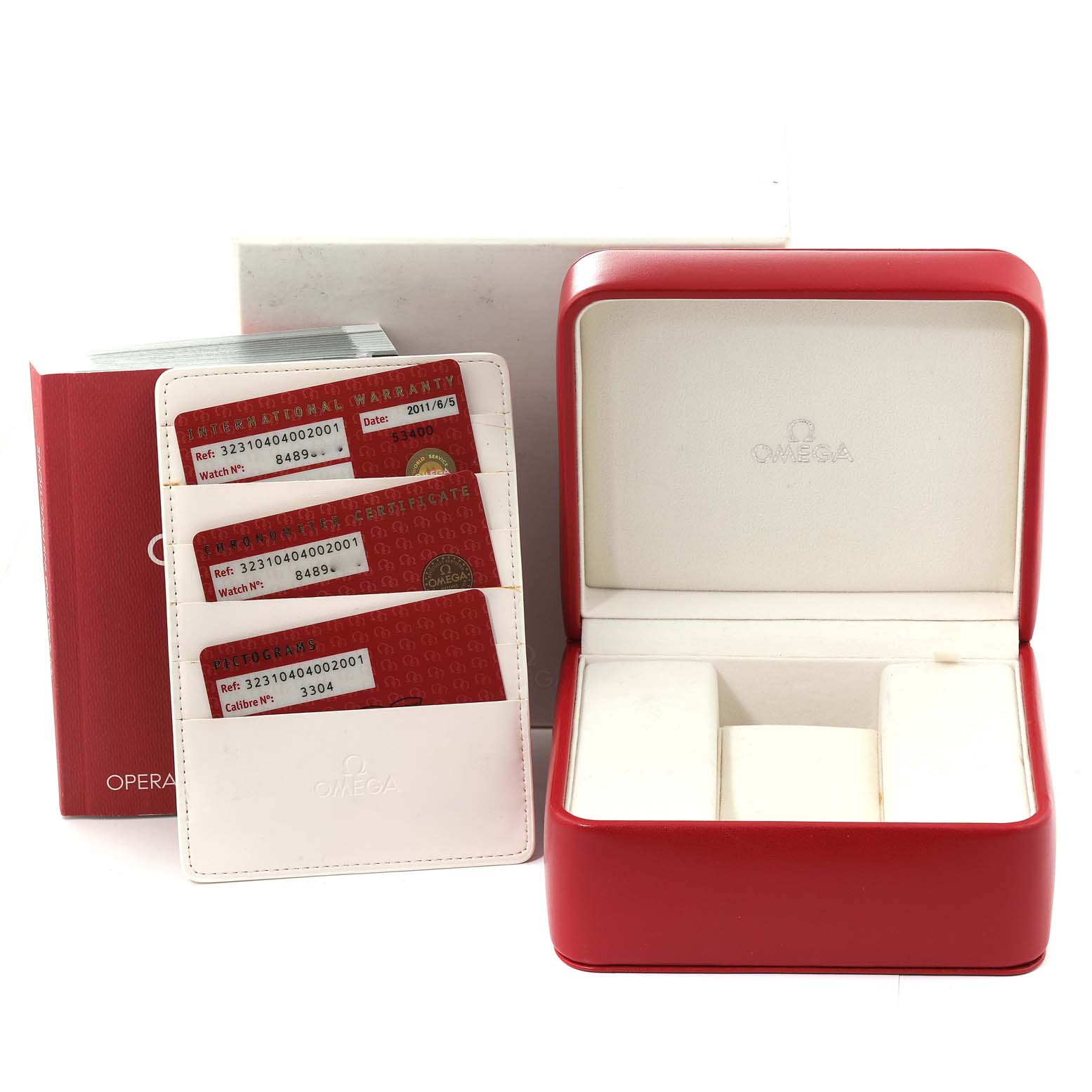 The image shows an Omega Speedmaster 323.10.40.40.02.001 Men
s Stainless Steel Silver Dial 323.10.40.40.02.001 Men
s Stainless Steel Silver Dial watch box, warranty cards, and user manual from a front angle.