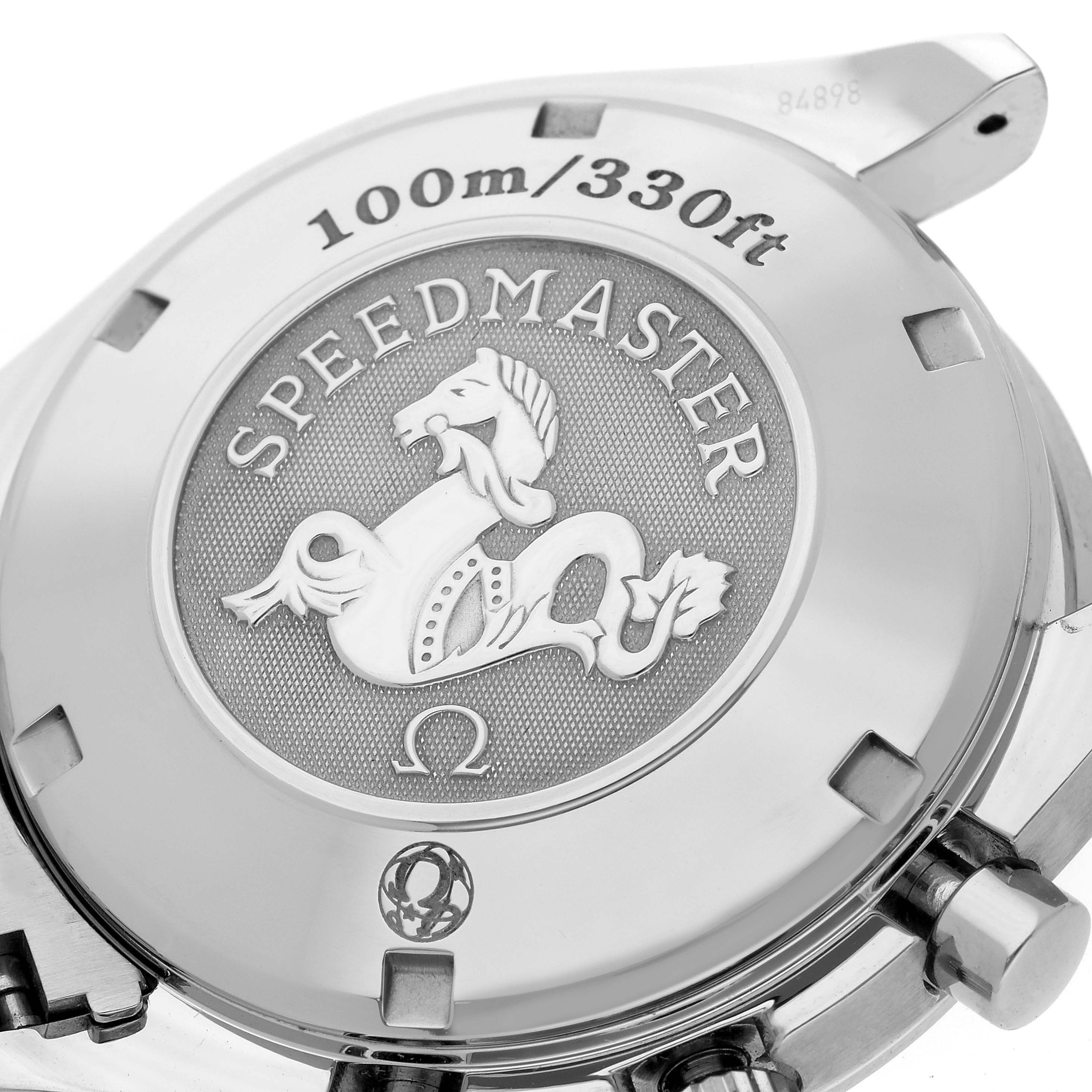 This image shows the case back of an Omega Speedmaster 323.10.40.40.02.001 Men
s Stainless Steel Silver Dial 323.10.40.40.02.001 Men
s Stainless Steel Silver Dial watch, displaying its 100m/330ft water resistance.