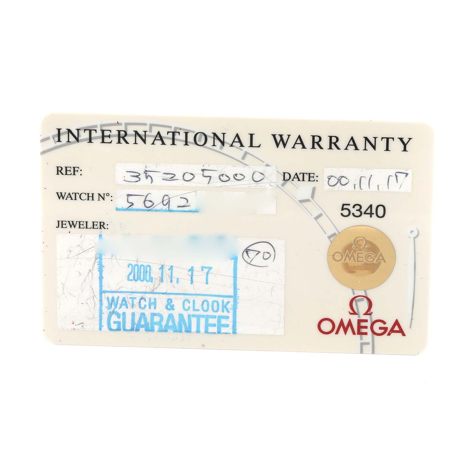 This image shows the international warranty card for an Omega Speedmaster 3520.50.00 Men's Stainless Steel Black Dial 3520.50.00 Men's Stainless Steel Black Dial watch.