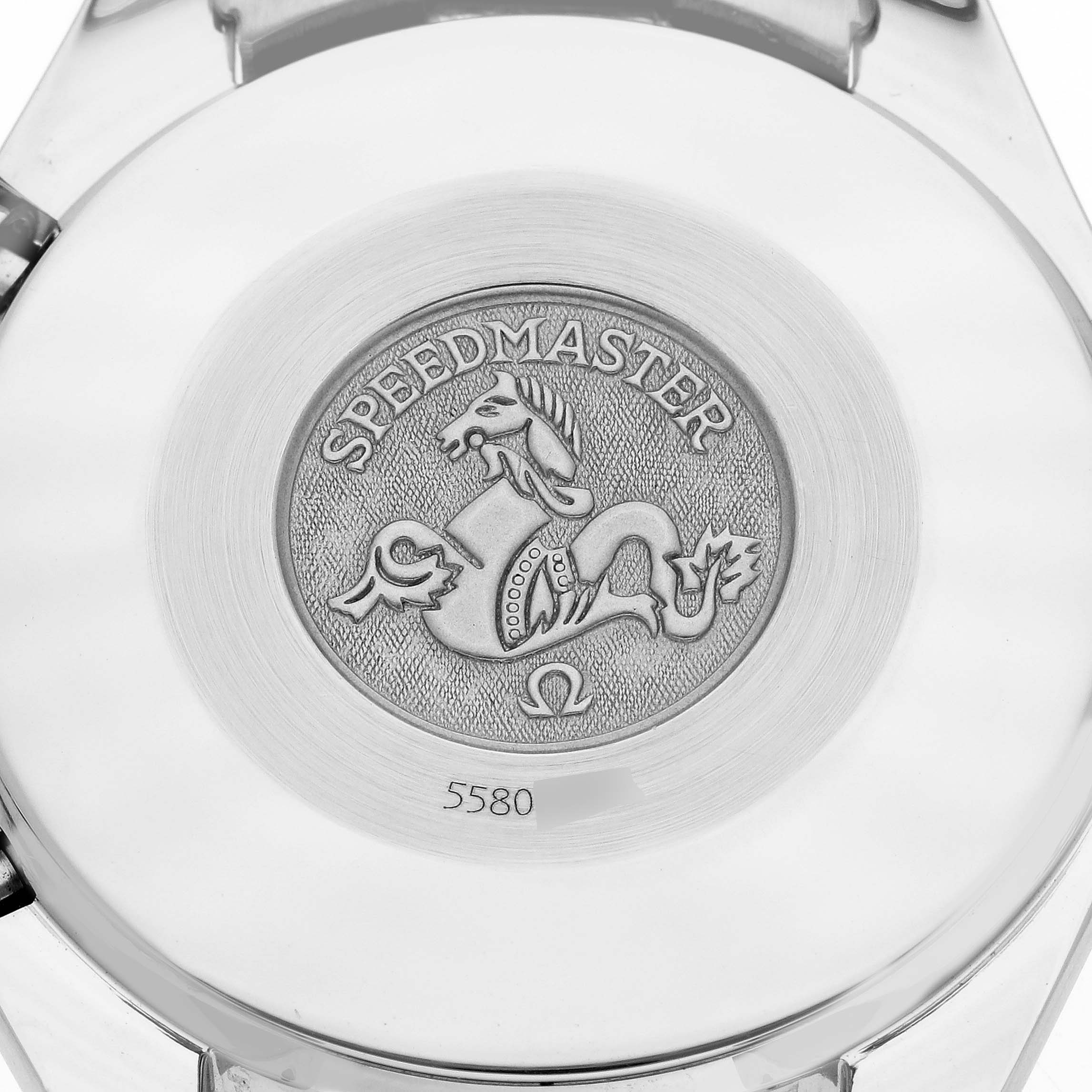 The image shows the back case of an Omega Speedmaster 3510.12.00 Men
s Stainless Steel Yellow Dial 3510.12.00 Men
s Stainless Steel Yellow Dial watch, featuring the engraved logo and model number.