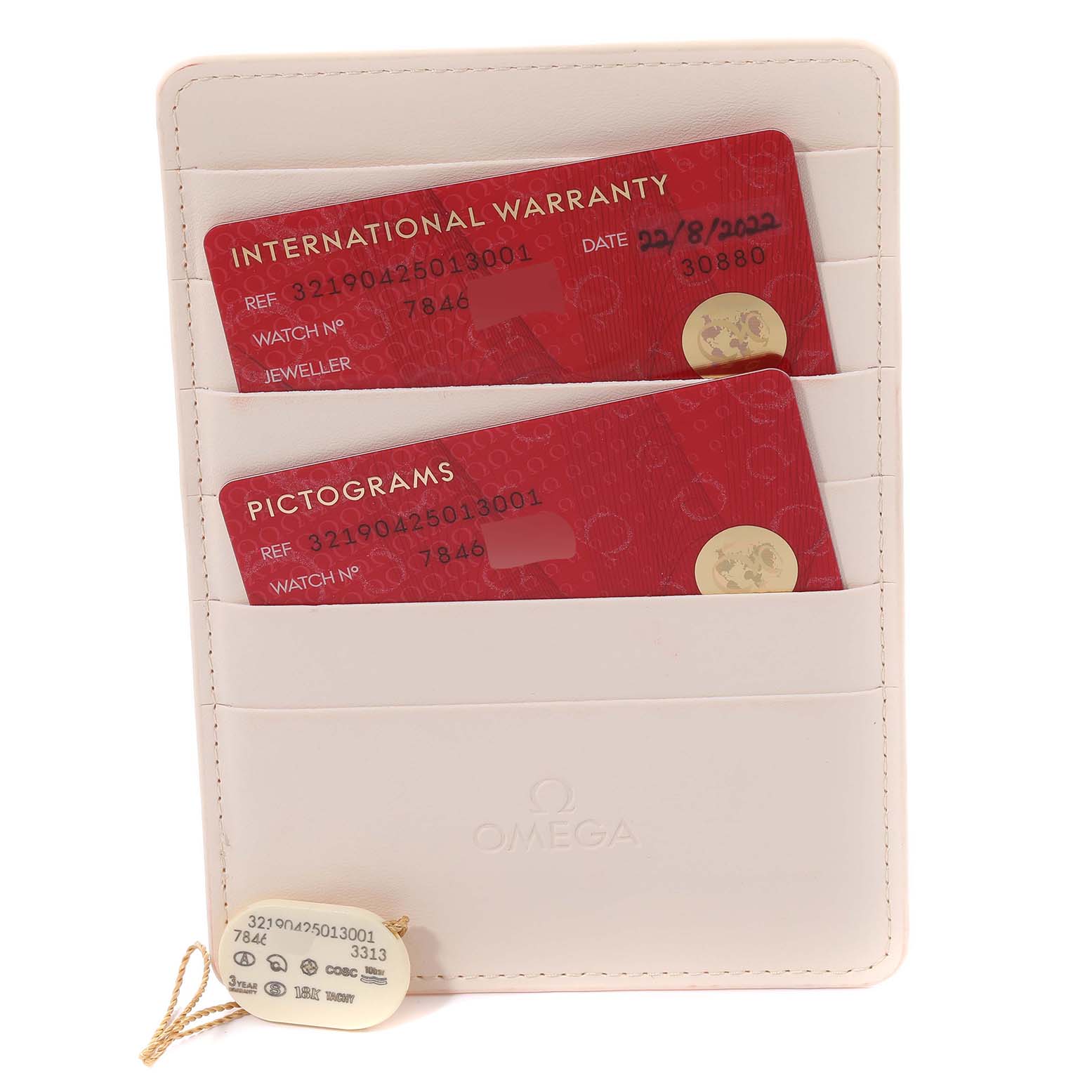 The image shows an Omega Speedmaster 321.90.42.50.13.001 Men's Steel and Gold (two tone) Brown Dial 321.90.42.50.13.001 Men's Steel and Gold (two tone) Brown Dial International Warranty card and a Pictograms card in a white holder.