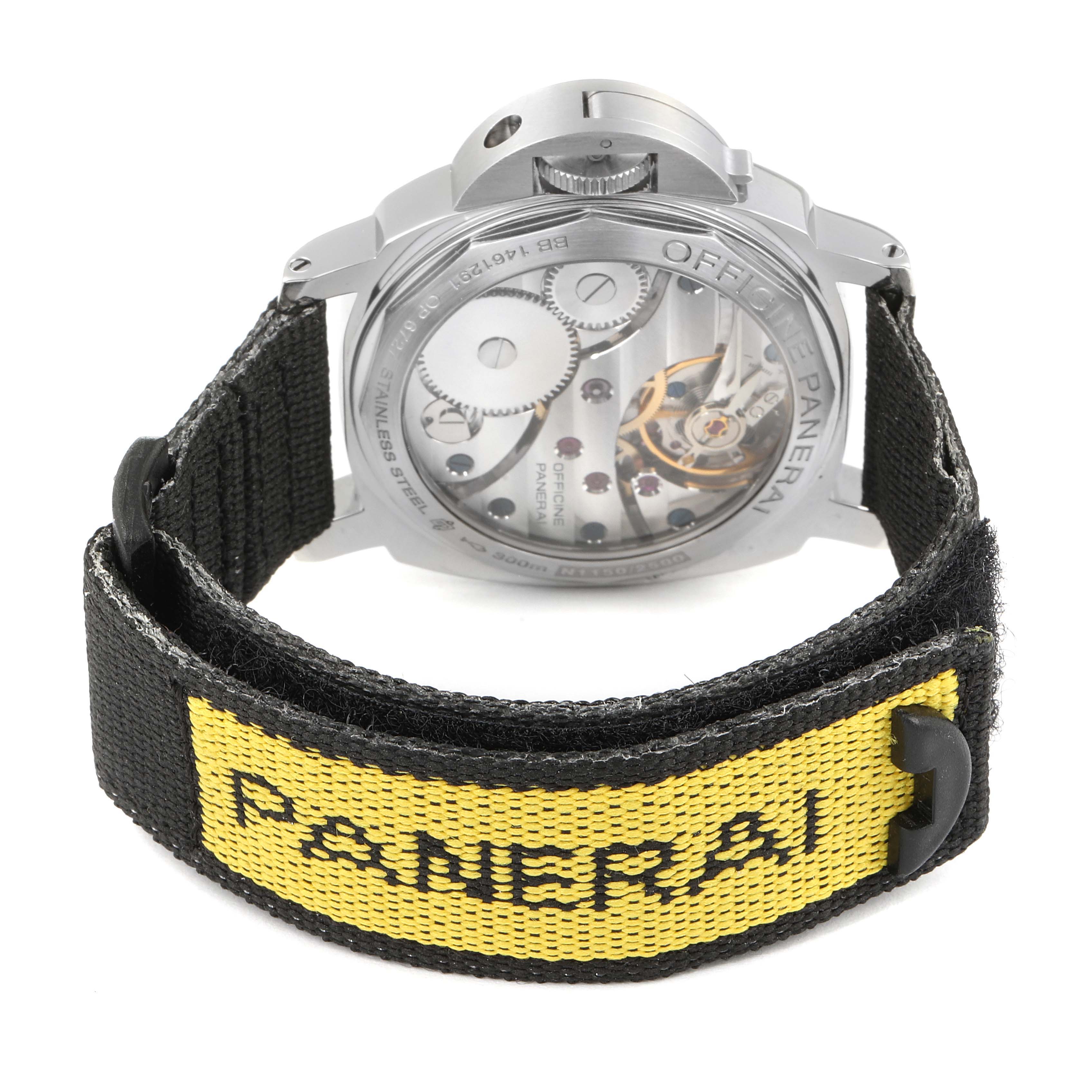 The image shows the back of a Panerai Luminor PAM00111 Men
s Stainless Steel Black Dial PAM00111 Men
s Stainless Steel Black Dial model watch, displaying its internal gears and a black strap with "Panerai" branding.