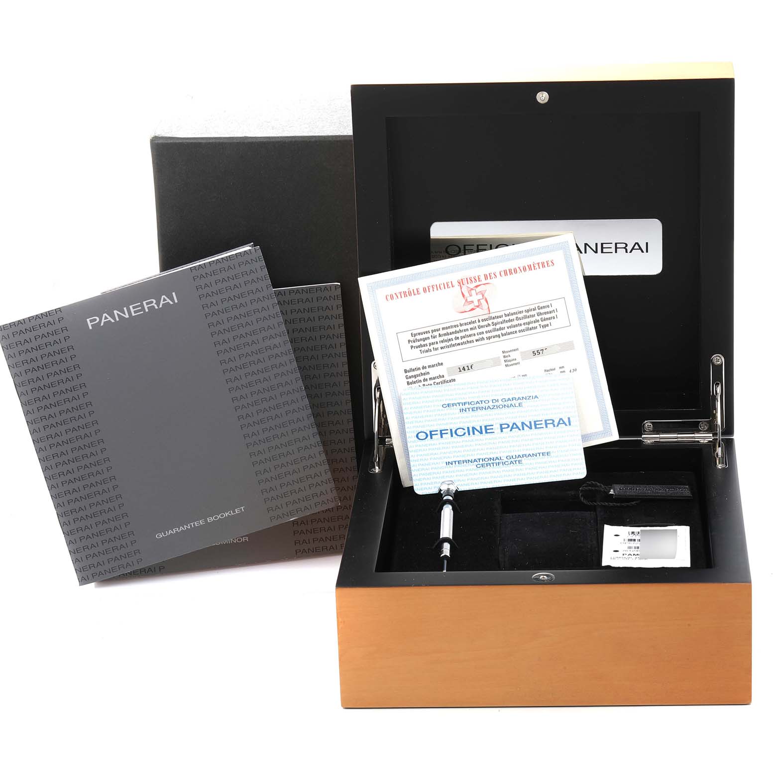 The image shows a Panerai Luminor PAM00111 Men
s Stainless Steel Black Dial PAM00111 Men
s Stainless Steel Black Dial watch box with certification documents, a booklet, and watch tools from a top-front angle.