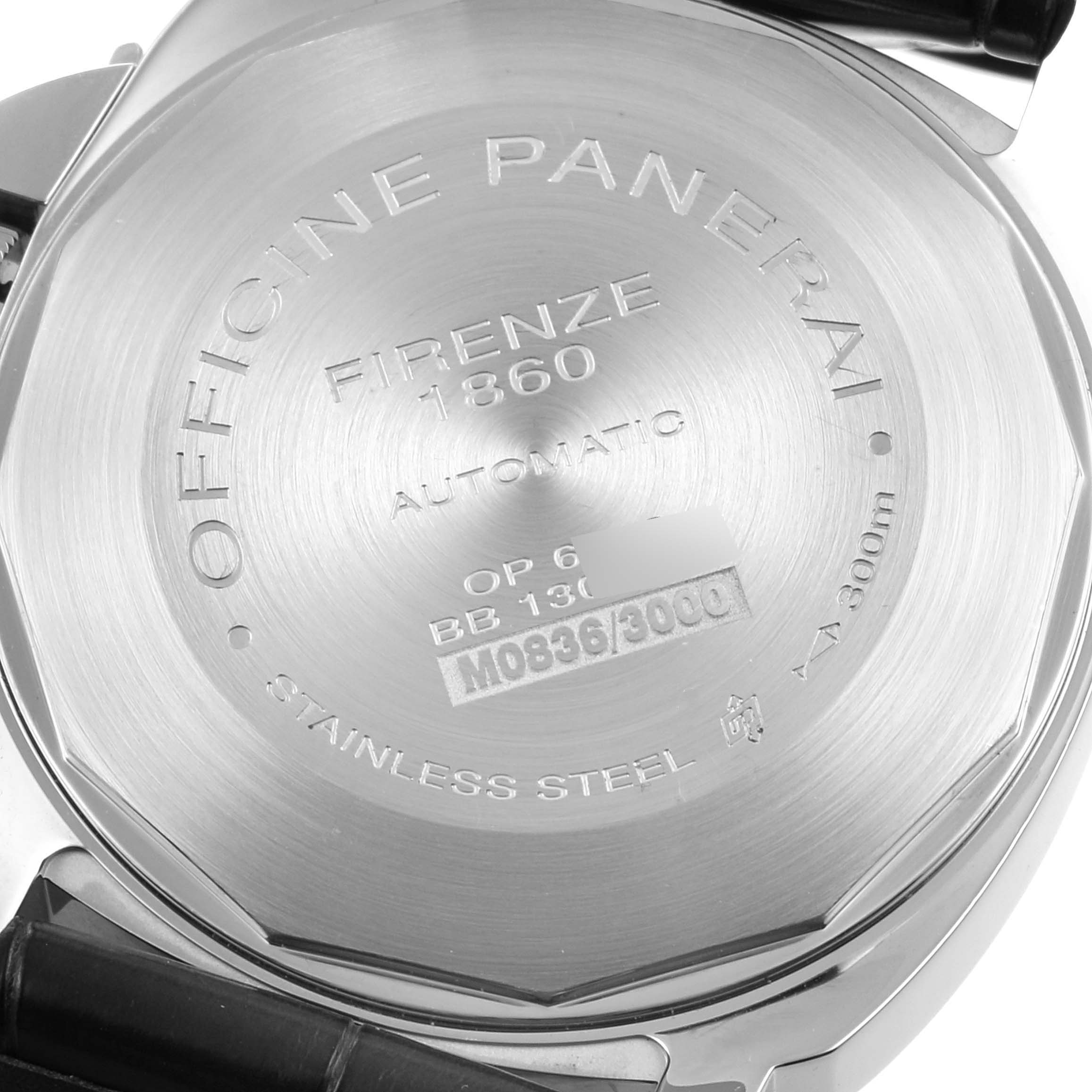 The image shows the back case of the Panerai Luminor PAM00104 Men
s Stainless Steel Black Dial PAM00104 Men
s Stainless Steel Black Dial watch, displaying engravings and serial numbers.