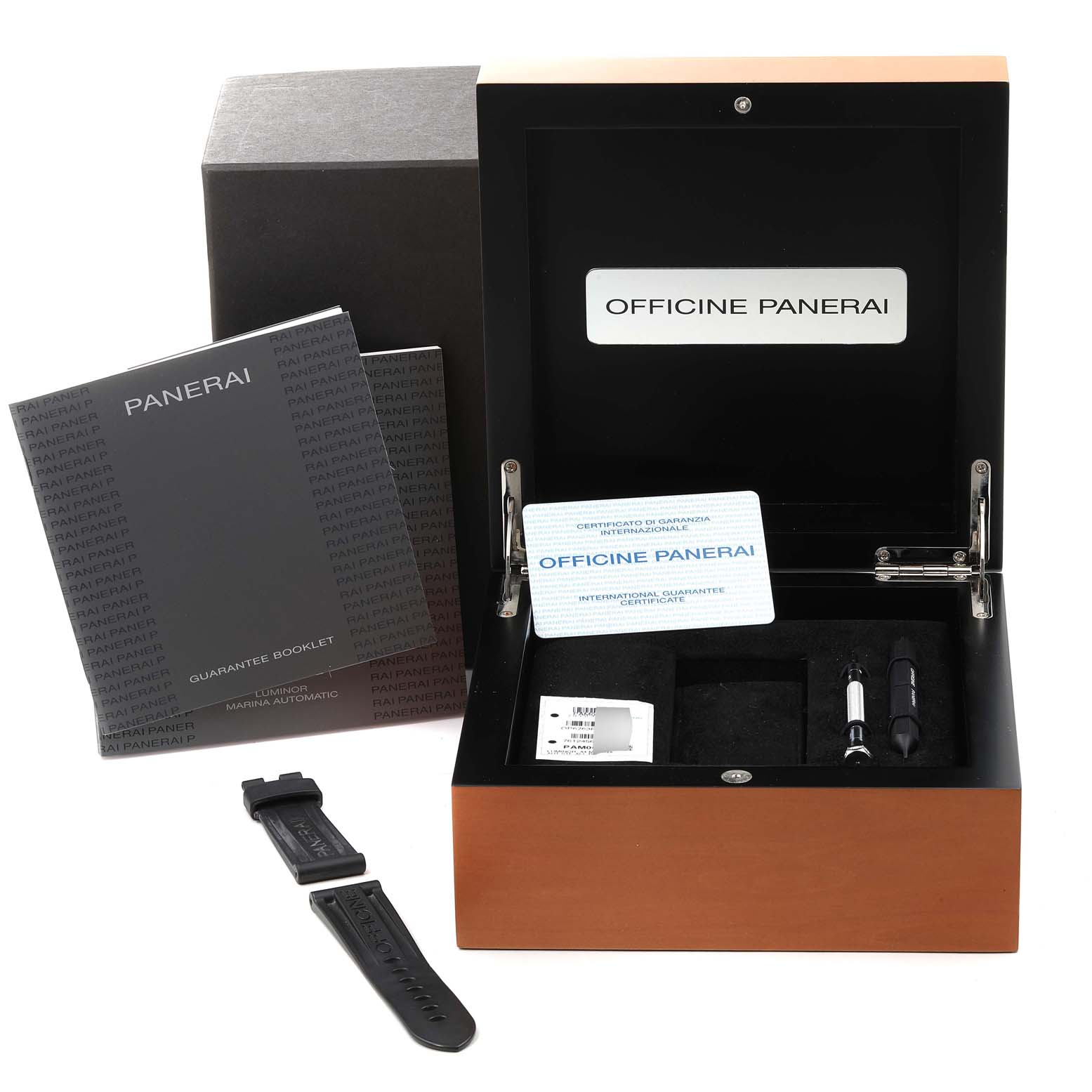 The image shows a Panerai Luminor PAM00104 Men
s Stainless Steel Black Dial PAM00104 Men
s Stainless Steel Black Dial watch box, guarantee booklet, spare strap, and tools at a frontal angle.