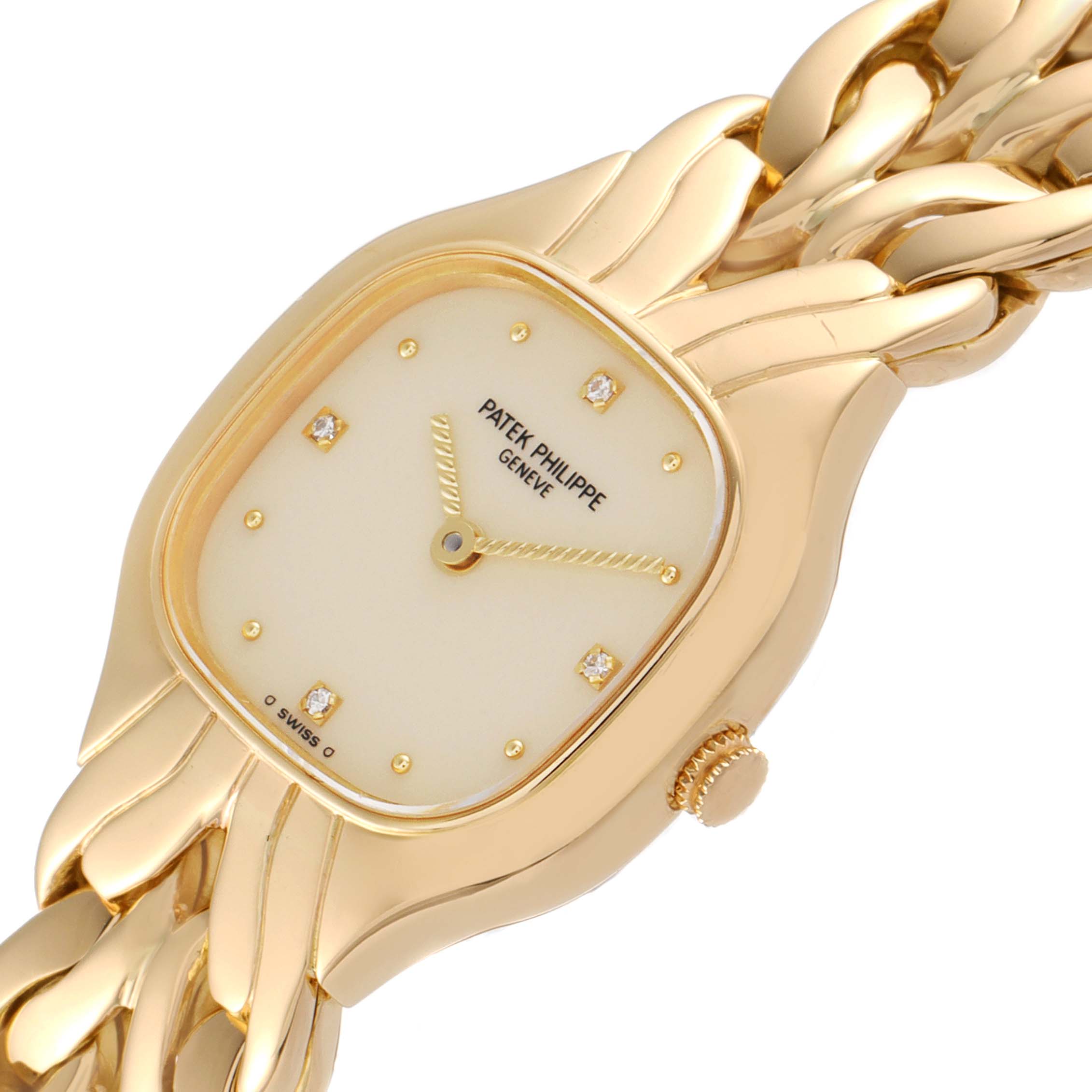 The image shows an angled view of the La Flamme model by Patek Philippe, highlighting its gold-tone face, bracelet, and crown.