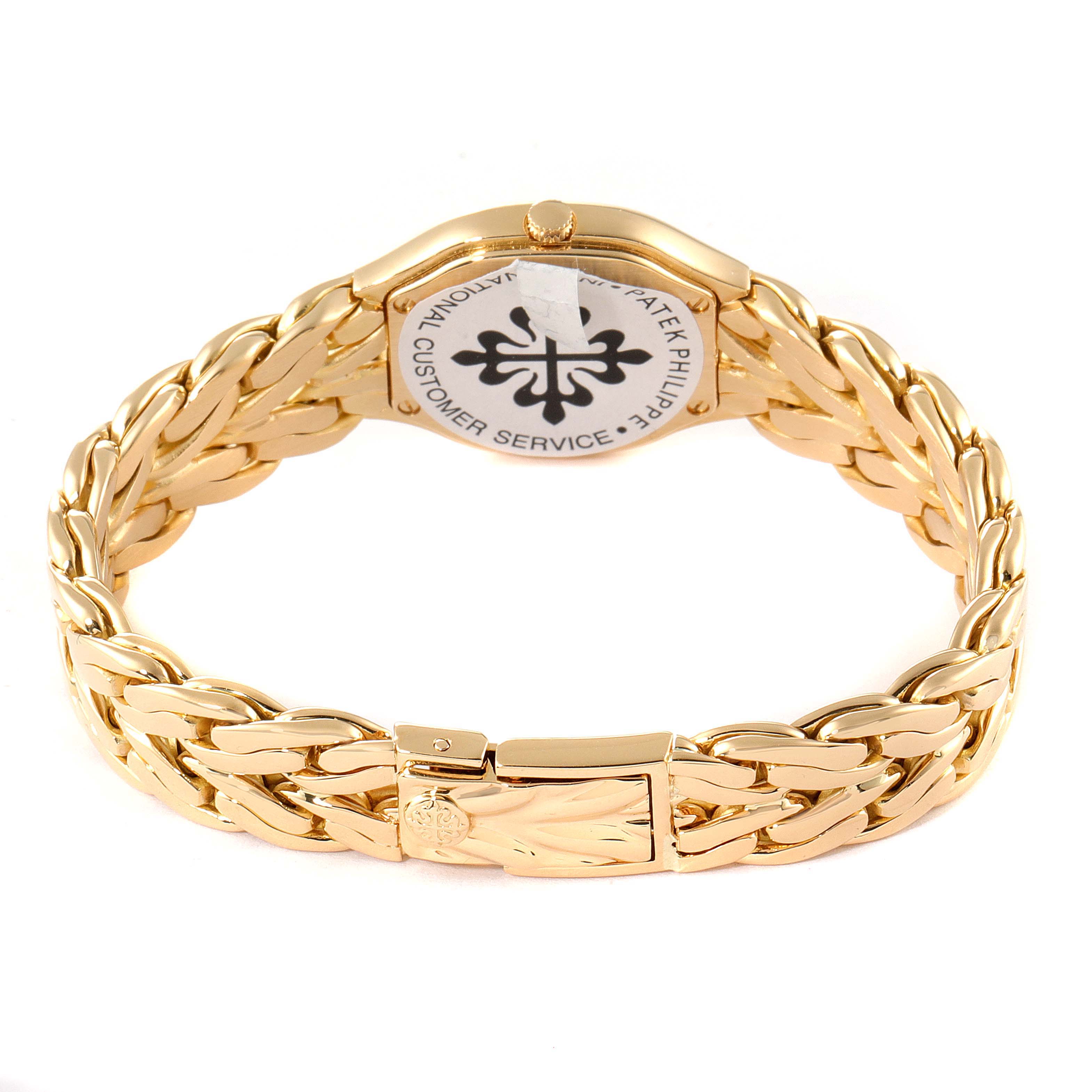 The image shows the back view of a Patek Philippe La Flamme  4815/1J Women's Yellow Gold Beige Dial 4815/1J Women's Yellow Gold Beige Dialwatch with its gold bracelet and clasp.