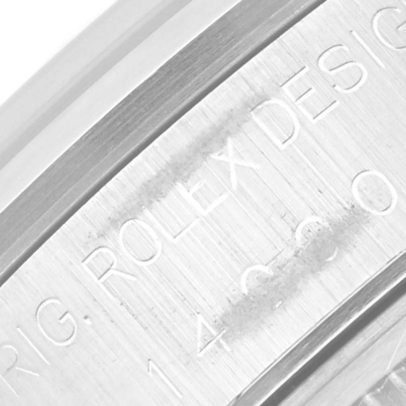 This image shows a close-up view of the engravings on the case side of a Rolex Air-King 14000 Men's Stainless Steel Silver Dial 14000 Men's Stainless Steel Silver Dial watch.