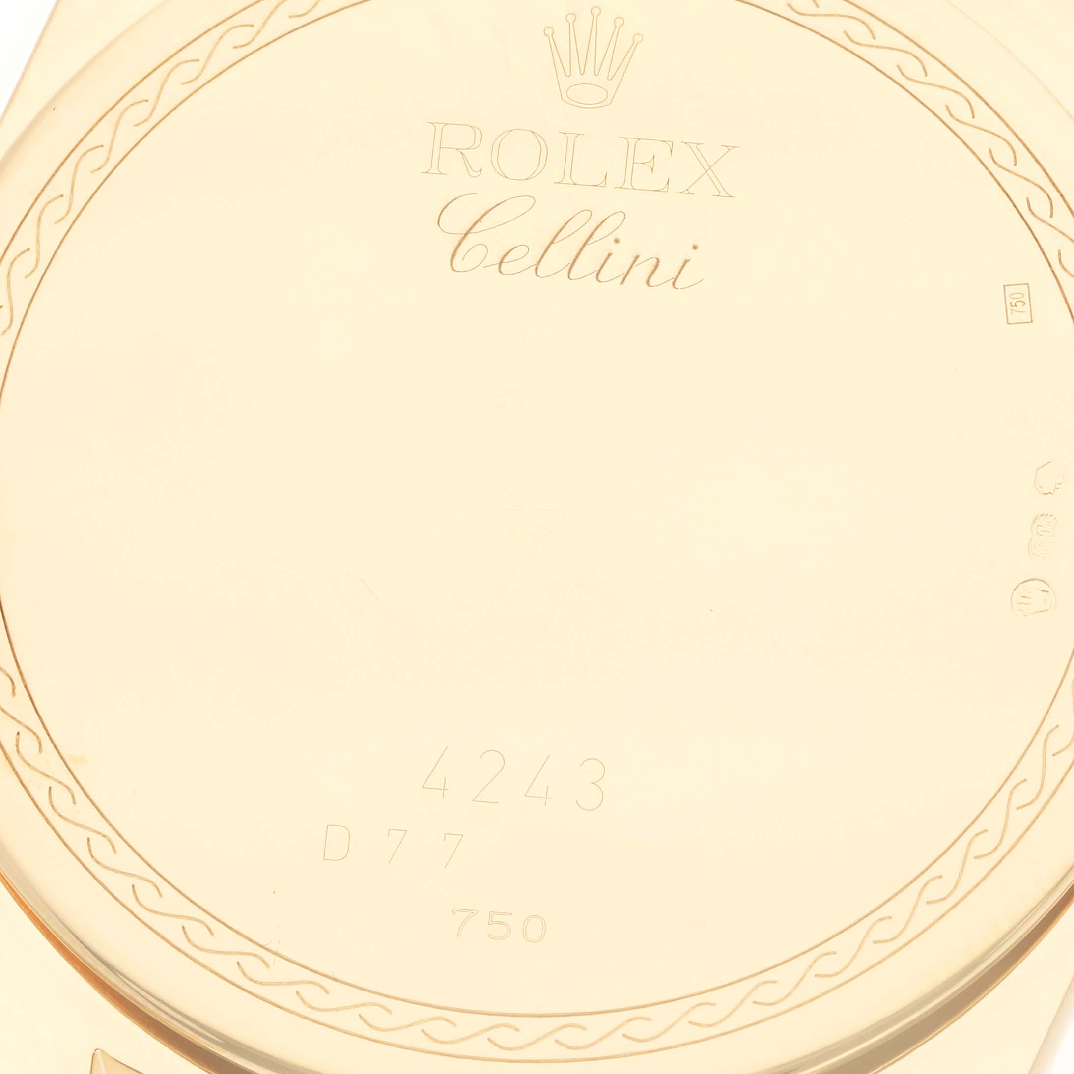 The image shows the back case of a Rolex Cellini 4243 Men's Yellow Gold Black Dial 4243 Men's Yellow Gold Black Dial watch with engraved branding and model information.