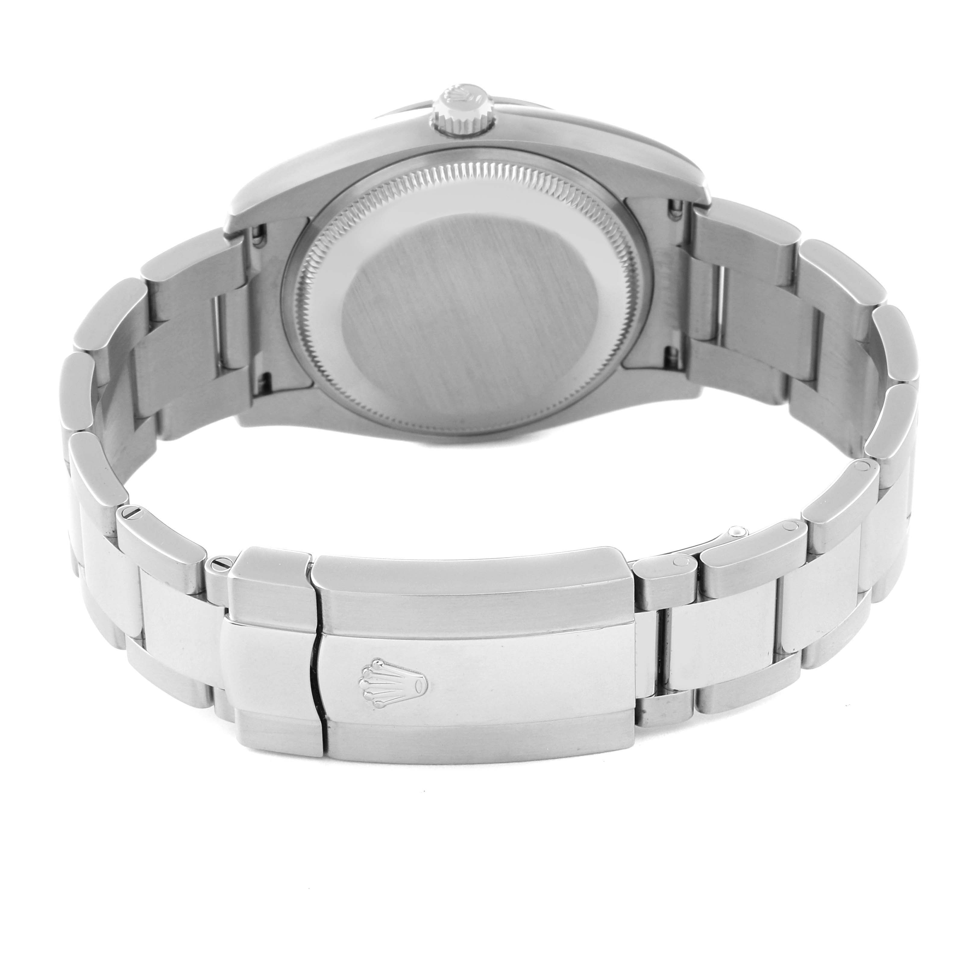 The image shows the back and clasp of a Rolex Date 115200 Men's Stainless Steel Black Dial 115200 Men's Stainless Steel Black Dial model watch from a rear view angle.