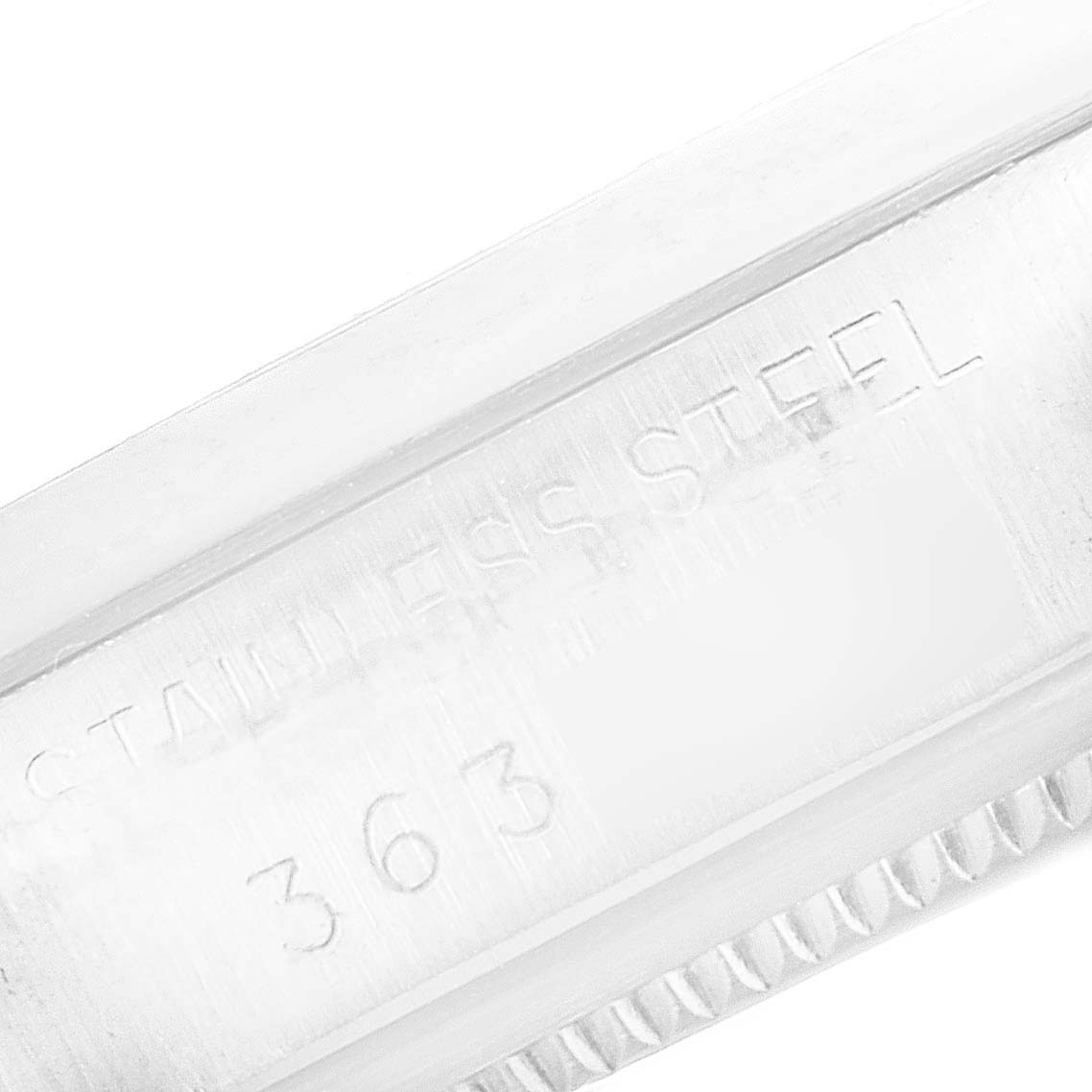 This image shows a close-up angle focusing on the engraved case and bezel of the Vintage Collection model by Rolex.