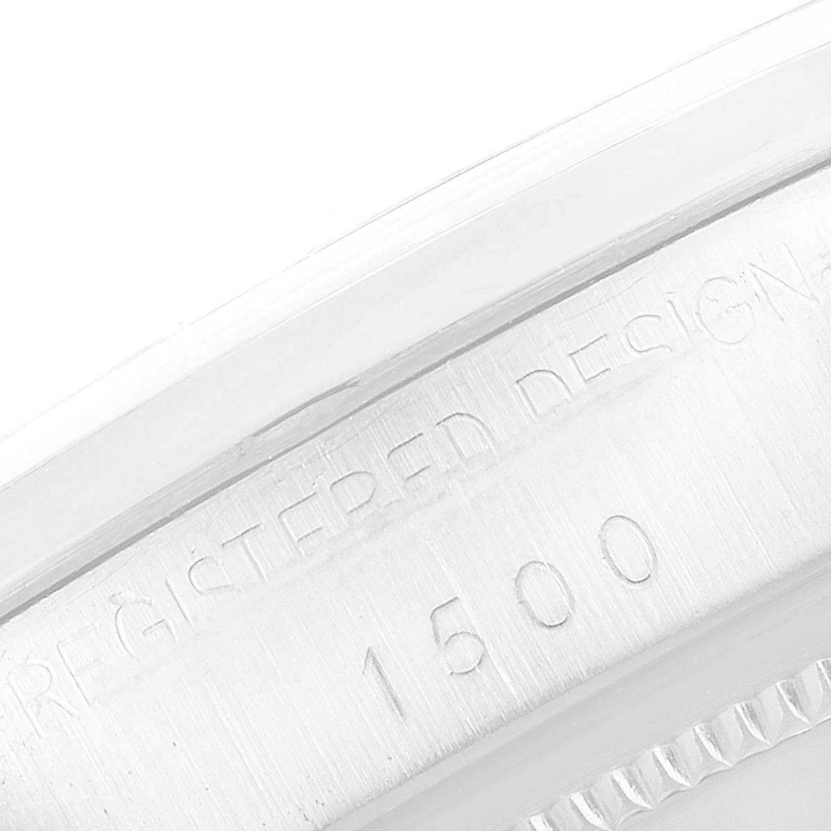 This image shows a close-up of the engraved serial number "1500" and “Registered Design” on the case side of a Rolex Vintage Collection 1500 Men's Stainless Steel Silver Dial 1500 Men's Stainless Steel Silver Dial watch.