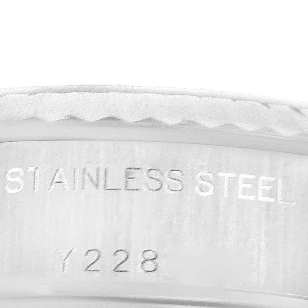 This close-up image shows the stainless steel material and part of the model number on the Rolex Datejust 79174 Women's Stainless Steel Pink Dial 79174 Women's Stainless Steel Pink Dial watch.