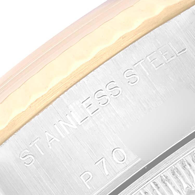 The image shows a close-up of the side of a stainless steel Rolex Datejust 79173 Women's Steel and Gold (two tone) Mother of Pearl Dial 79173 Women's Steel and Gold (two tone) Mother of Pearl Dial watch case, highlighting the engraved text.