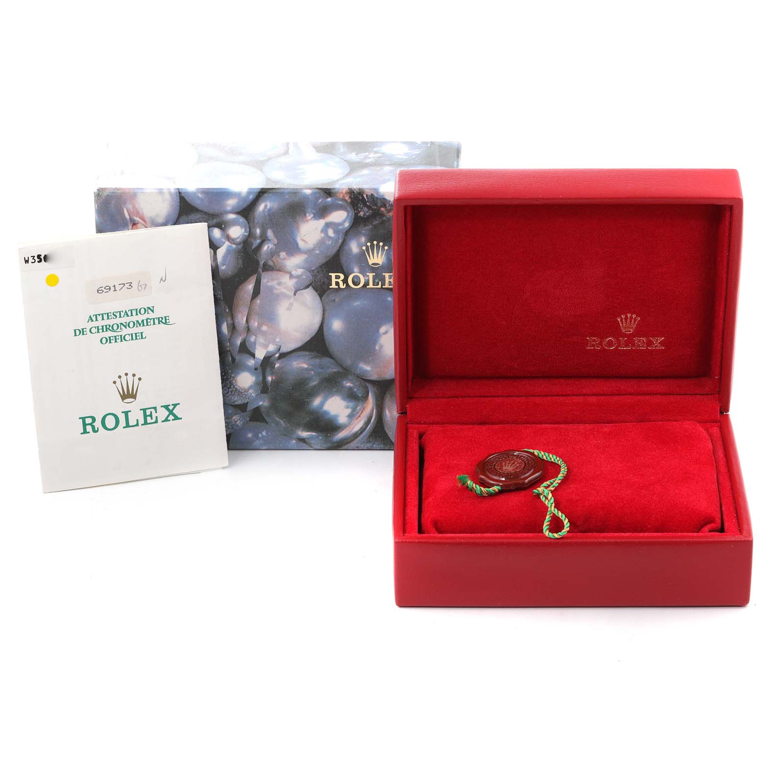 The image shows a Rolex Datejust 69173 Women
s Steel and Gold (two tone) Champagne Dial 69173 Women
s Steel and Gold (two tone) Champagne Dial watch box, certificate, and a hang tag, viewed from the front.