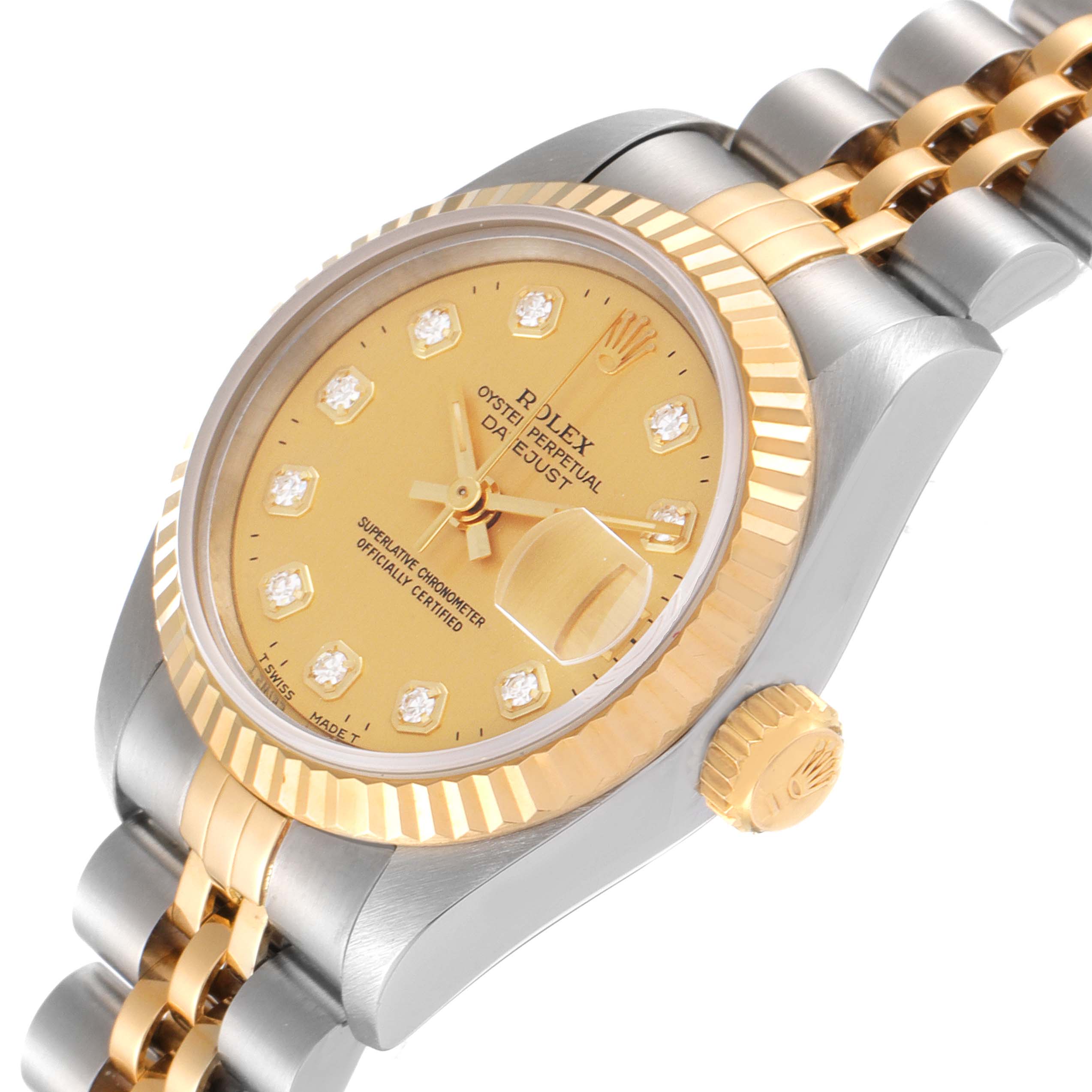 The image shows a close-up angle of the Rolex Datejust 69173 Women
s Steel and Gold (two tone) Champagne Dial 69173 Women
s Steel and Gold (two tone) Champagne Dial, highlighting its dial, crown, and part of its bracelet.