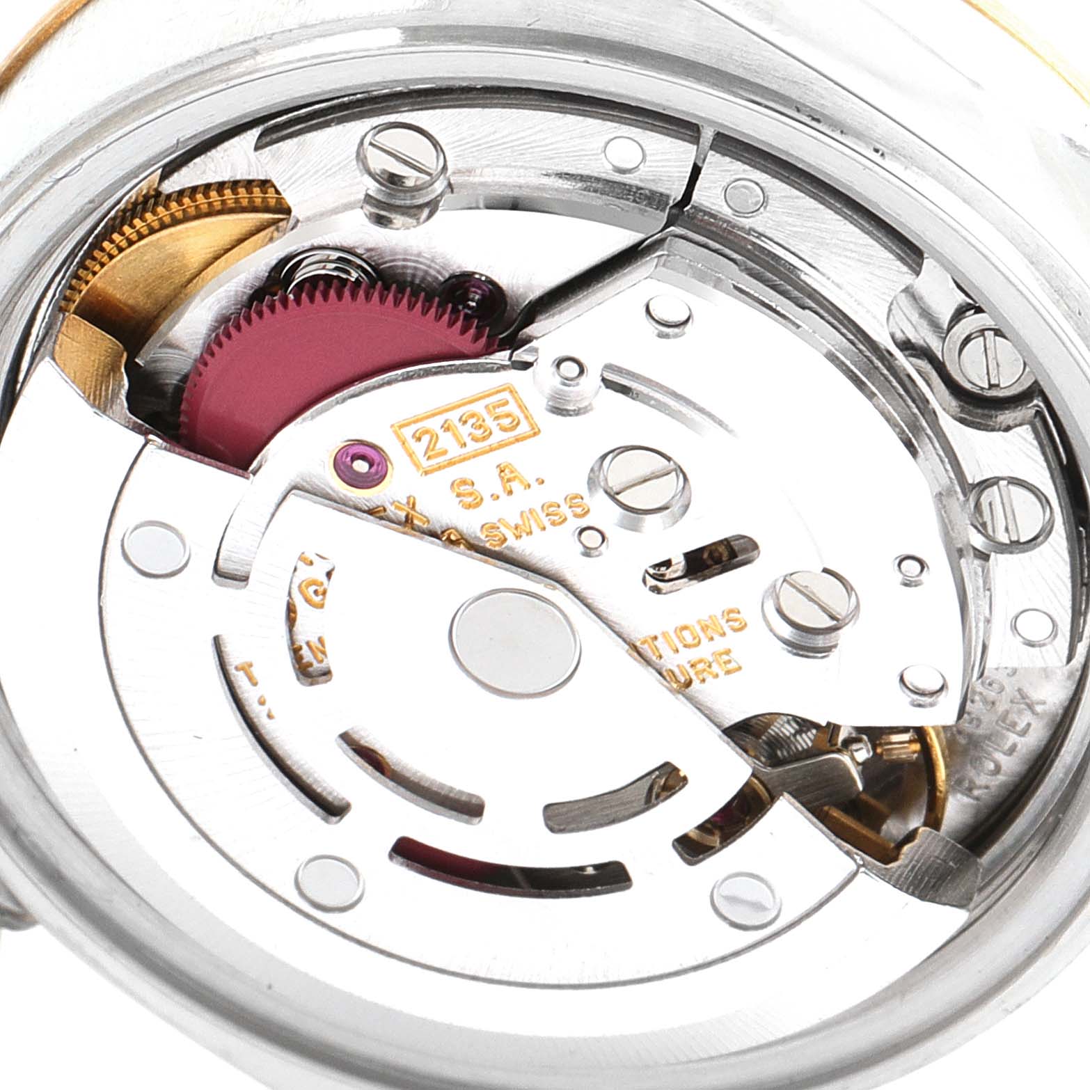 This is an image of the movement of a Rolex Datejust 69173 Women
s Steel and Gold (two tone) Champagne Dial 69173 Women
s Steel and Gold (two tone) Champagne Dial watch seen from the back, showing the internal gears and components.