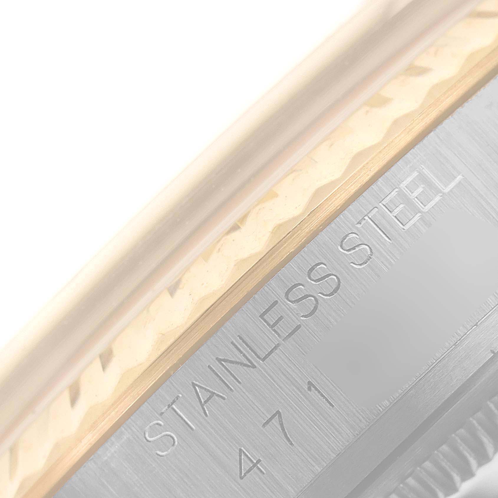 This close-up image shows the side of the Rolex Vintage Collection 16013 Men's Steel and Gold (two tone) Champagne Dial 16013 Men's Steel and Gold (two tone) Champagne Dial watch, highlighting the "STAINLESS STEEL" engraving.