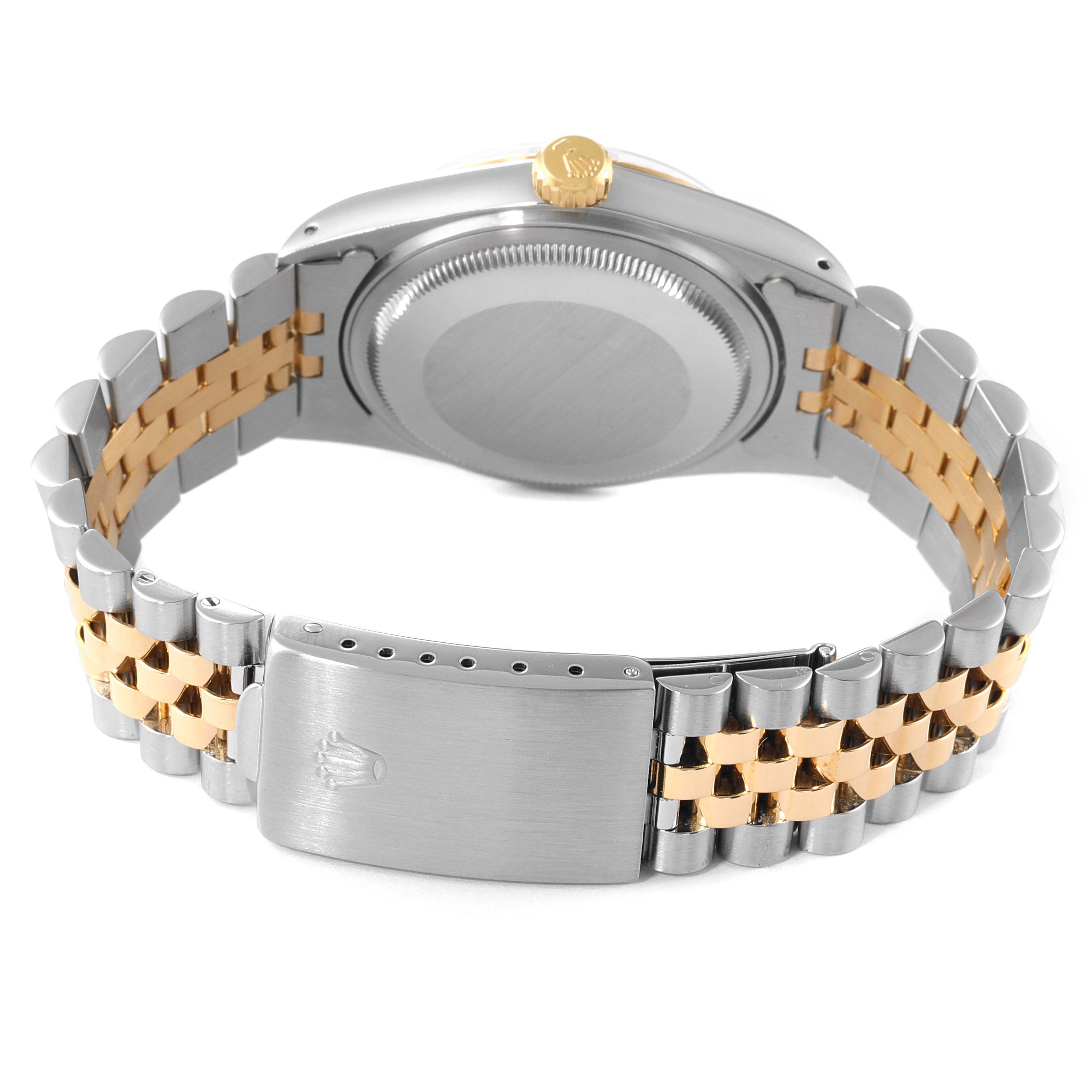 This image shows the back of a Rolex Vintage Collection 16013 Men's Steel and Gold (two tone) Champagne Dial 16013 Men's Steel and Gold (two tone) Champagne Dial watch, focusing on its two-tone bracelet and clasp.