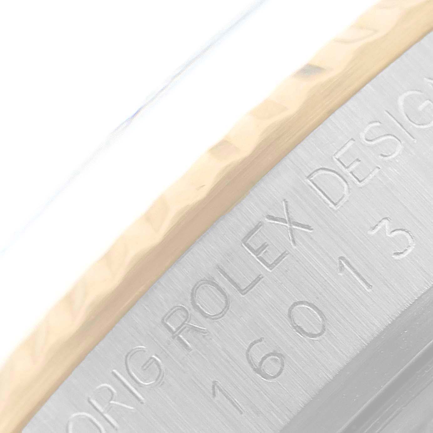 The image shows a close-up of the case side and bezel of the Rolex Vintage Collection 16013 Men
s Steel and Gold (two tone) Champagne Dial 16013 Men
s Steel and Gold (two tone) Champagne Dial model, with "ORIG ROLEX DESIGN 16013" engraved.