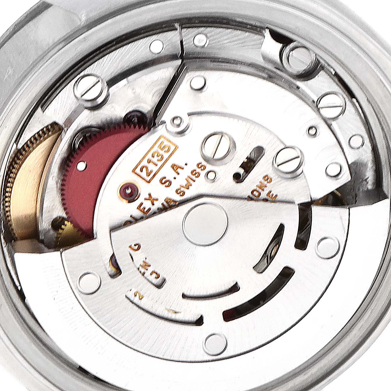 This image shows a close-up view of the movement mechanism of a Rolex Datejust 69174 Women's Stainless Steel Pink Dial 69174 Women's Stainless Steel Pink Dial watch.