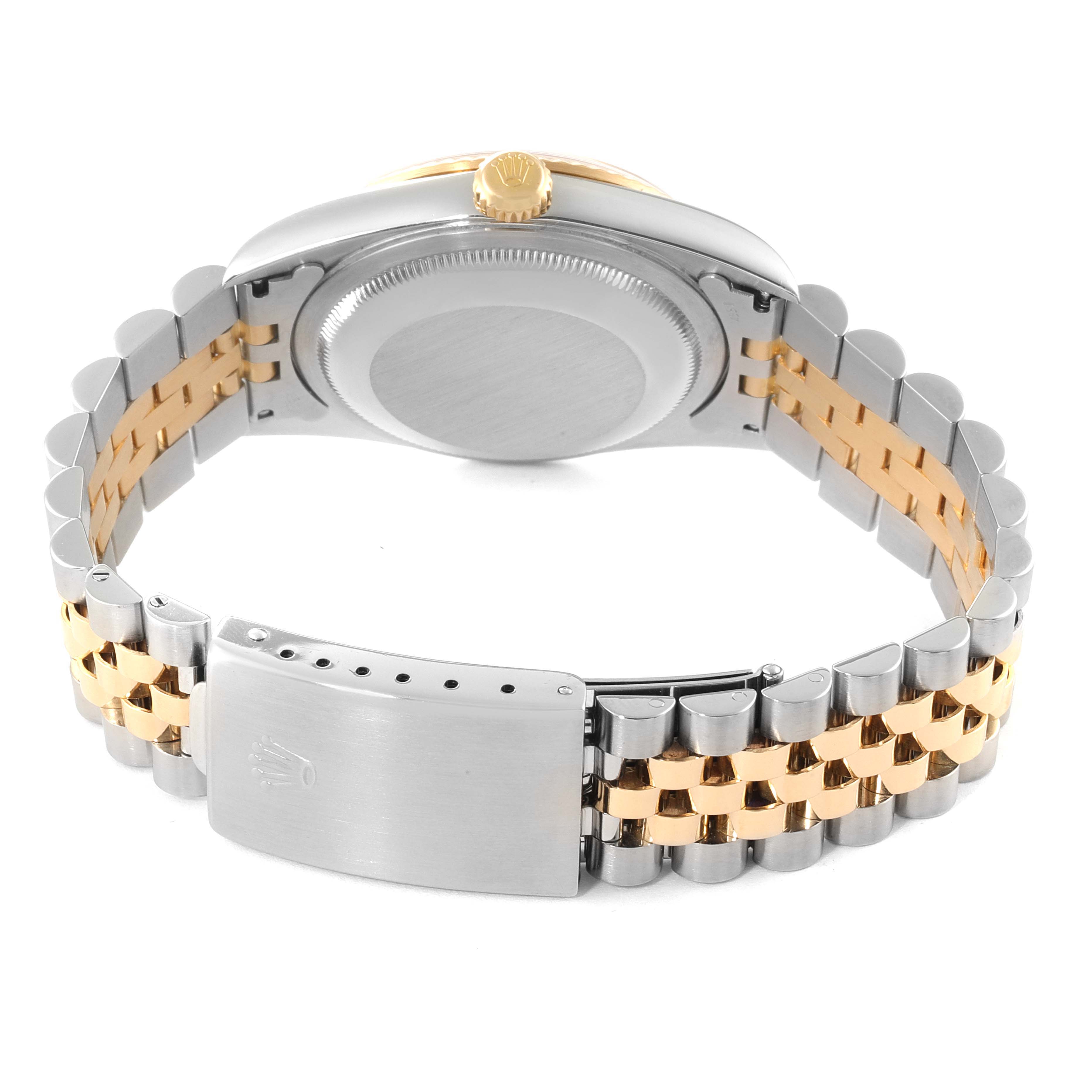 This image shows the backside of a Rolex Datejust 16233 Men's Steel and Gold (two tone) Champagne Dial 16233 Men's Steel and Gold (two tone) Champagne Dial watch with focus on the two-tone bracelet and clasp.