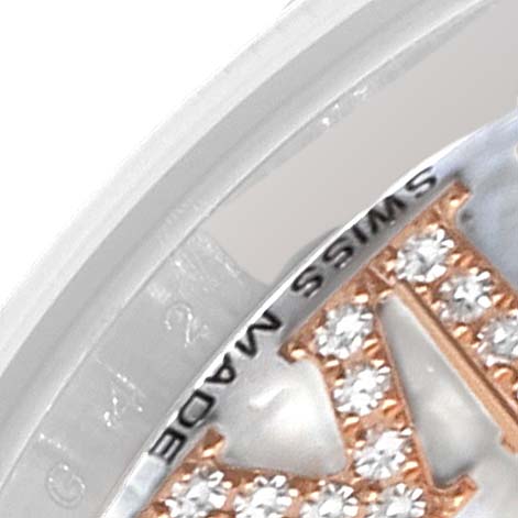 This close-up image shows a portion of the dial with diamond markers and the text "SWISS MADE" of a Rolex Datejust 179171NR Women's Steel and Gold (two tone) Mother of Pearl Dial 179171NR Women's Steel and Gold (two tone) Mother of Pearl Dial watch.