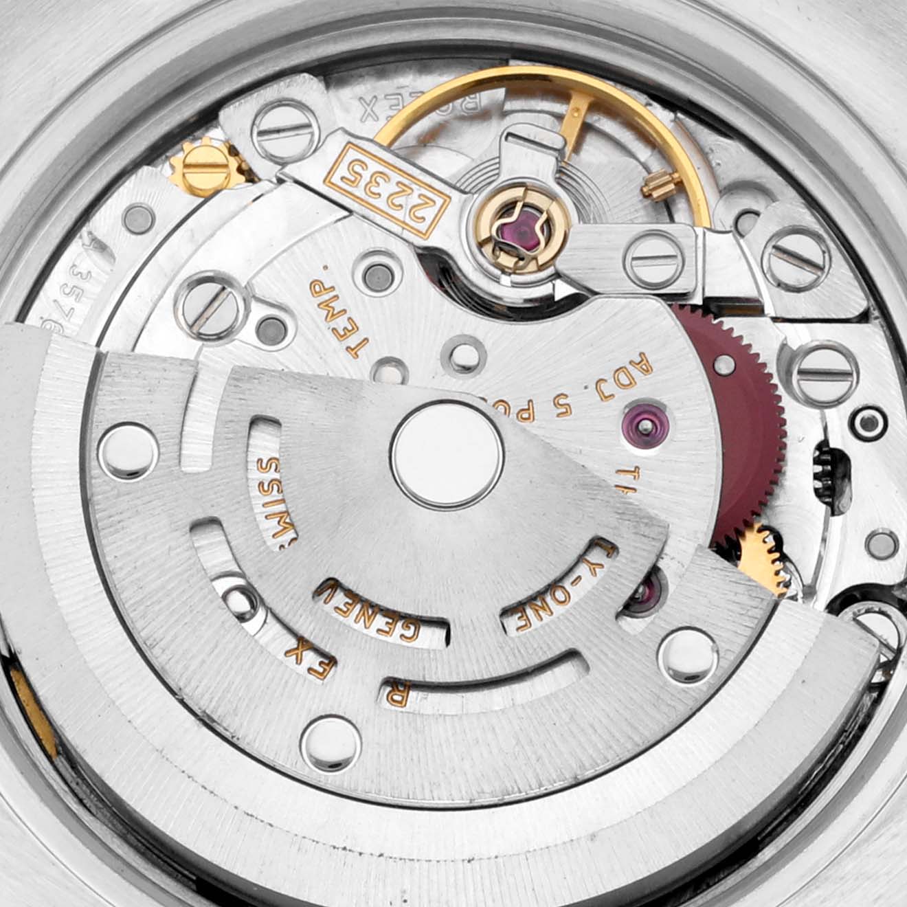 This Rolex Datejust 179171NR Women's Steel and Gold (two tone) Mother of Pearl Dial 179171NR Women's Steel and Gold (two tone) Mother of Pearl Dial watch image shows an angled view of the intricate movement and internal mechanical parts.