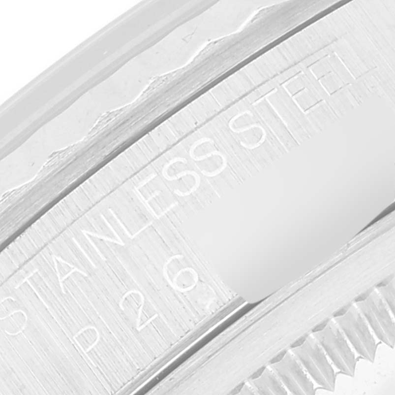 This close-up image shows the engraved bezel and part of the rehaut of a Rolex Datejust 16234 Men's Stainless Steel Silver Dial 16234 Men's Stainless Steel Silver Dial watch.