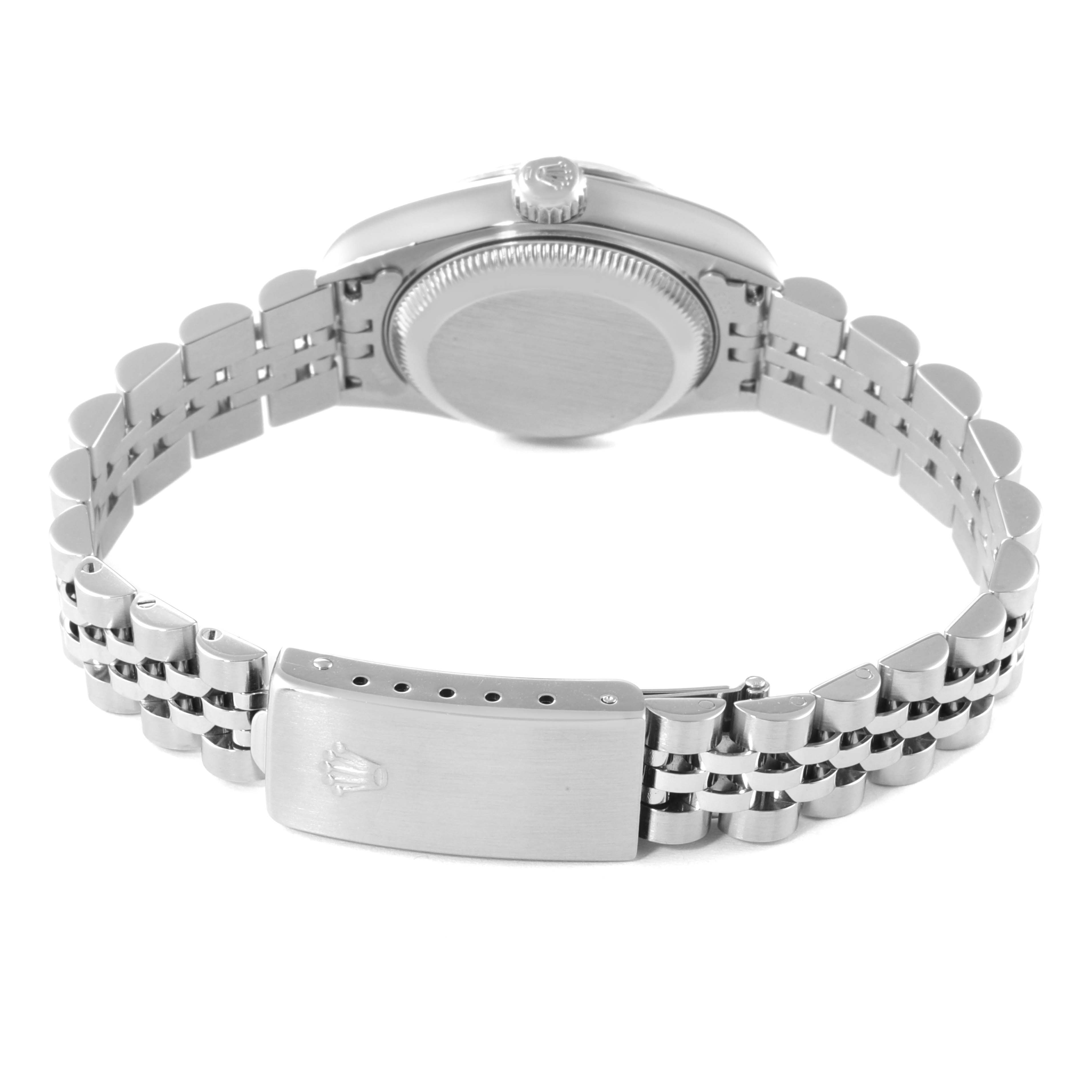 The image shows the back view of a Rolex Datejust 79174 Women's Stainless Steel White Dial 79174 Women's Stainless Steel White Dial watch, highlighting its clasp and part of the bracelet.