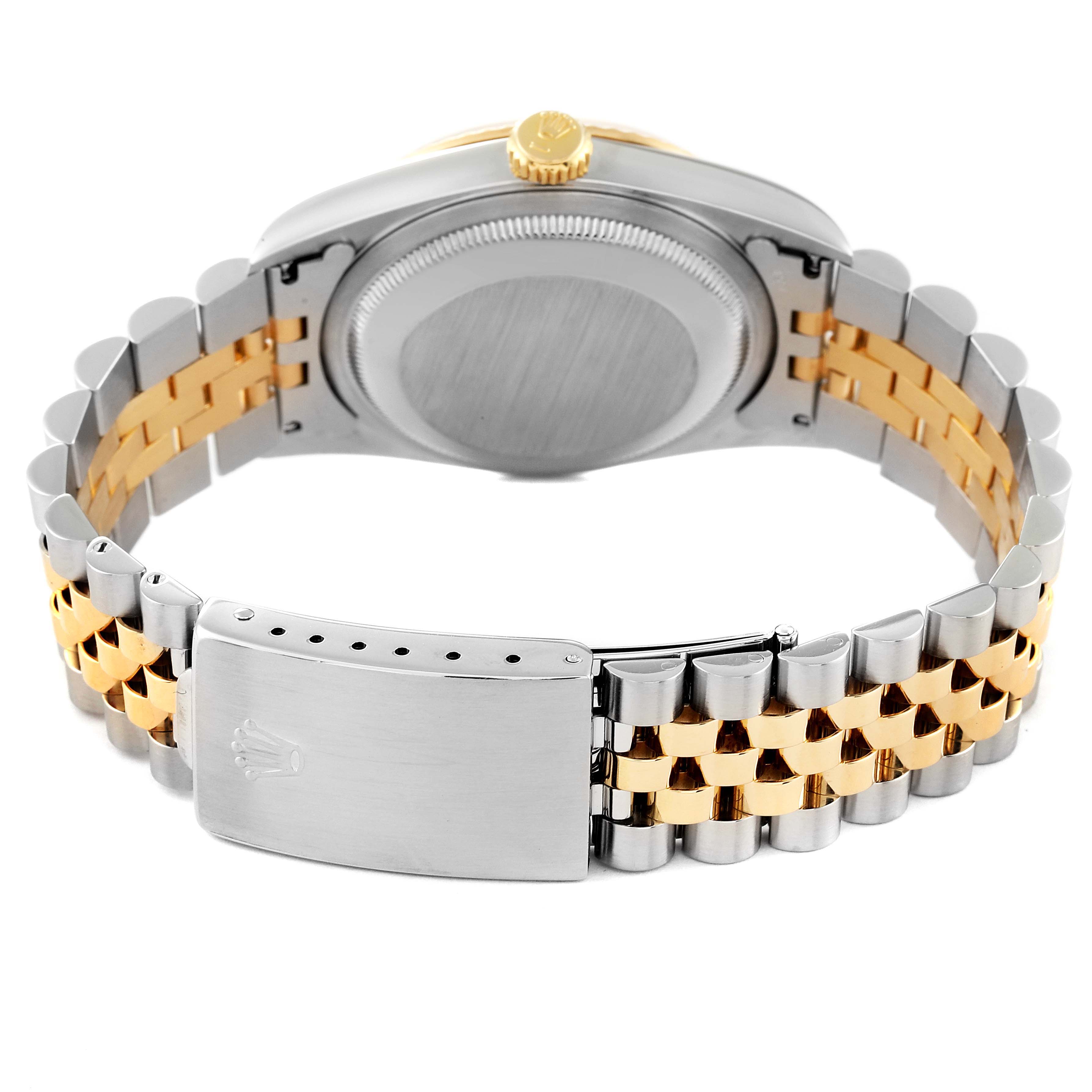 This image shows the back of a Rolex Datejust 16233 Men's Steel and Gold (two tone) Champagne Dial 16233 Men's Steel and Gold (two tone) Champagne Dial watch, focusing on the bracelet and clasp in a two-tone metal.