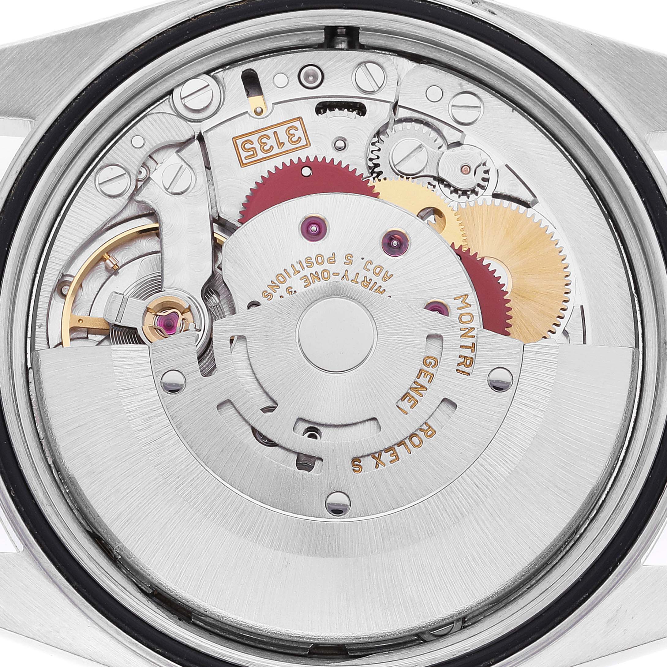 The image shows the internal movement and parts of a Rolex Datejust 16233 Men's Steel and Gold (two tone) Champagne Dial 16233 Men's Steel and Gold (two tone) Champagne Dial watch from a back view angle.