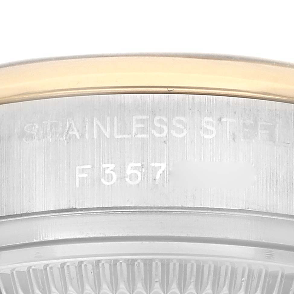 The image shows a close-up of the serial number and "STAINLESS STEEL" engraving on the case back of a Rolex Datejust 179163 Women's Steel and Gold (two tone) Blue Dial 179163 Women's Steel and Gold (two tone) Blue Dial watch.