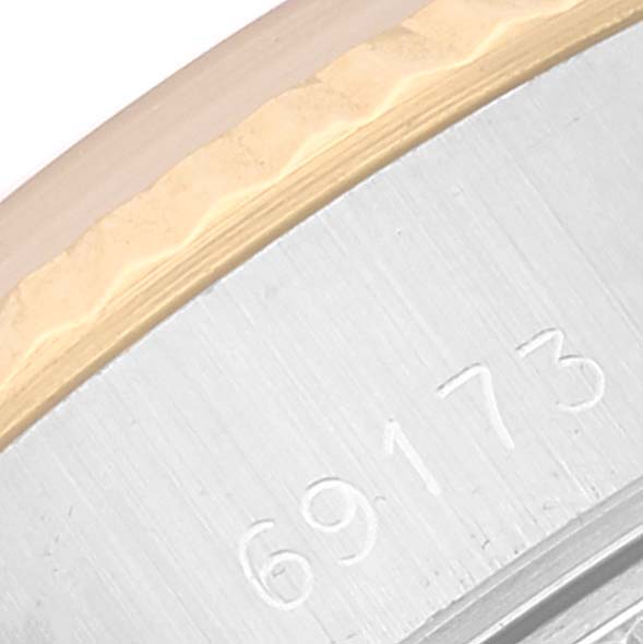 This close-up photo of the Rolex Datejust 69173 Women's Steel and Gold (two tone) Champagne Dial 69173 Women's Steel and Gold (two tone) Champagne Dial watch shows the reference number "69173" and part of the bezel.