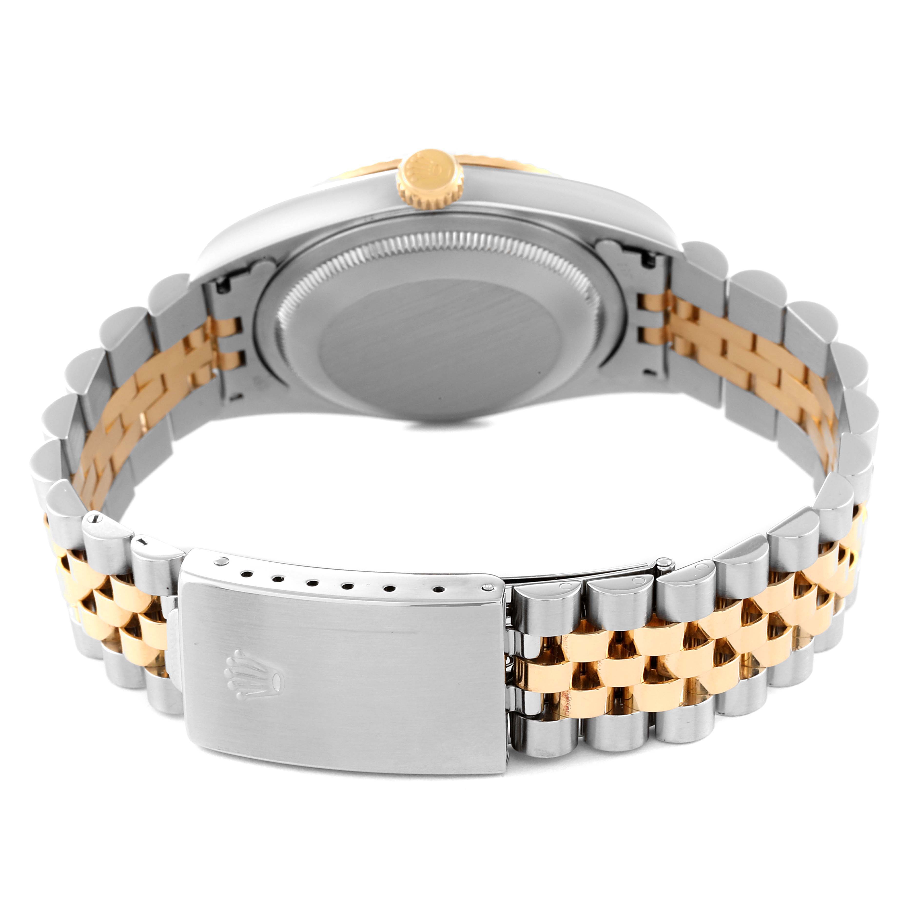 The image shows the back case, crown, and two-tone Jubilee bracelet of a Rolex Datejust 16233 Men's Steel and Gold (two tone) Champagne Dial 16233 Men's Steel and Gold (two tone) Champagne Dial watch.