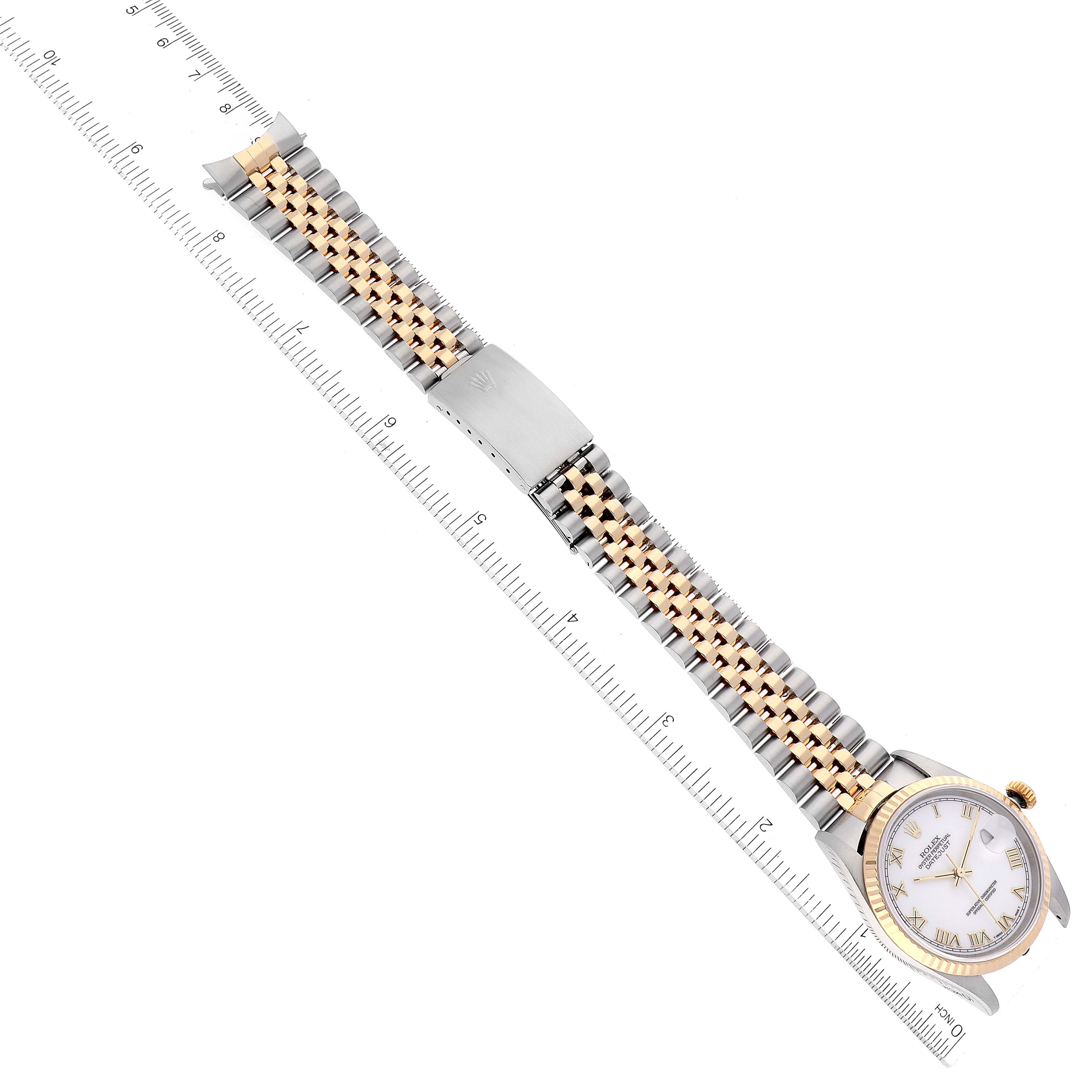 The image shows a Rolex Datejust 16233 Men's Steel and Gold (two tone) White Dial 16233 Men's Steel and Gold (two tone) White Dial watch laid flat, displaying the watch face, bezel, and two-tone bracelet with a clasp.