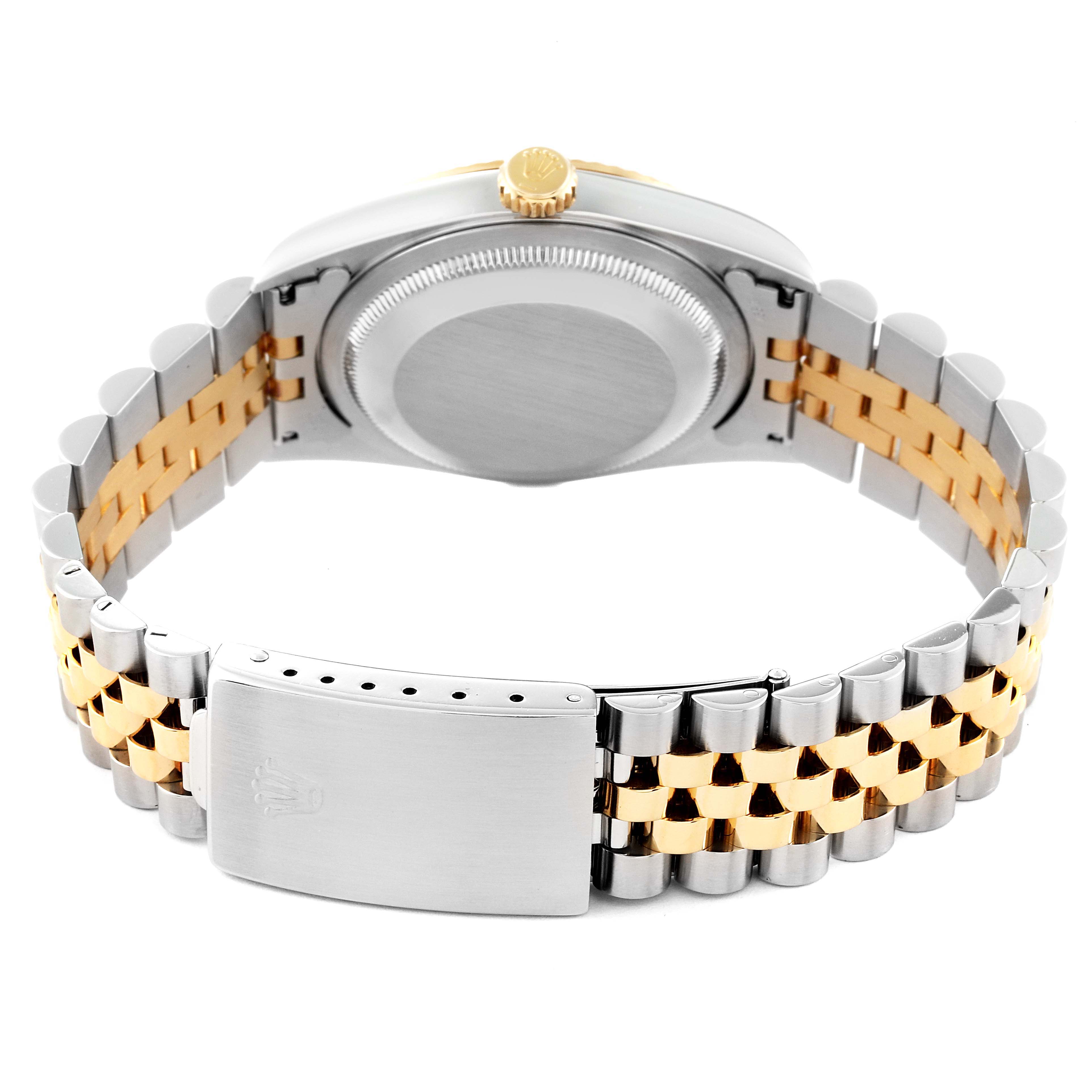 The image shows the back view of a Rolex Datejust 16233 Men's Steel and Gold (two tone) White Dial 16233 Men's Steel and Gold (two tone) White Dial watch, featuring its gold and silver Jubilee bracelet and clasp.