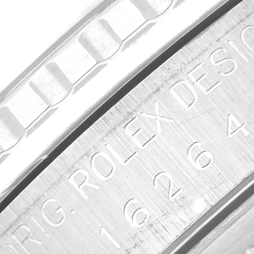 This image shows a close-up of the engraved details on the casing of a Rolex Turn-o-Graph 16264 Men
s Stainless Steel Blue Dial 16264 Men
s Stainless Steel Blue Dial watch.