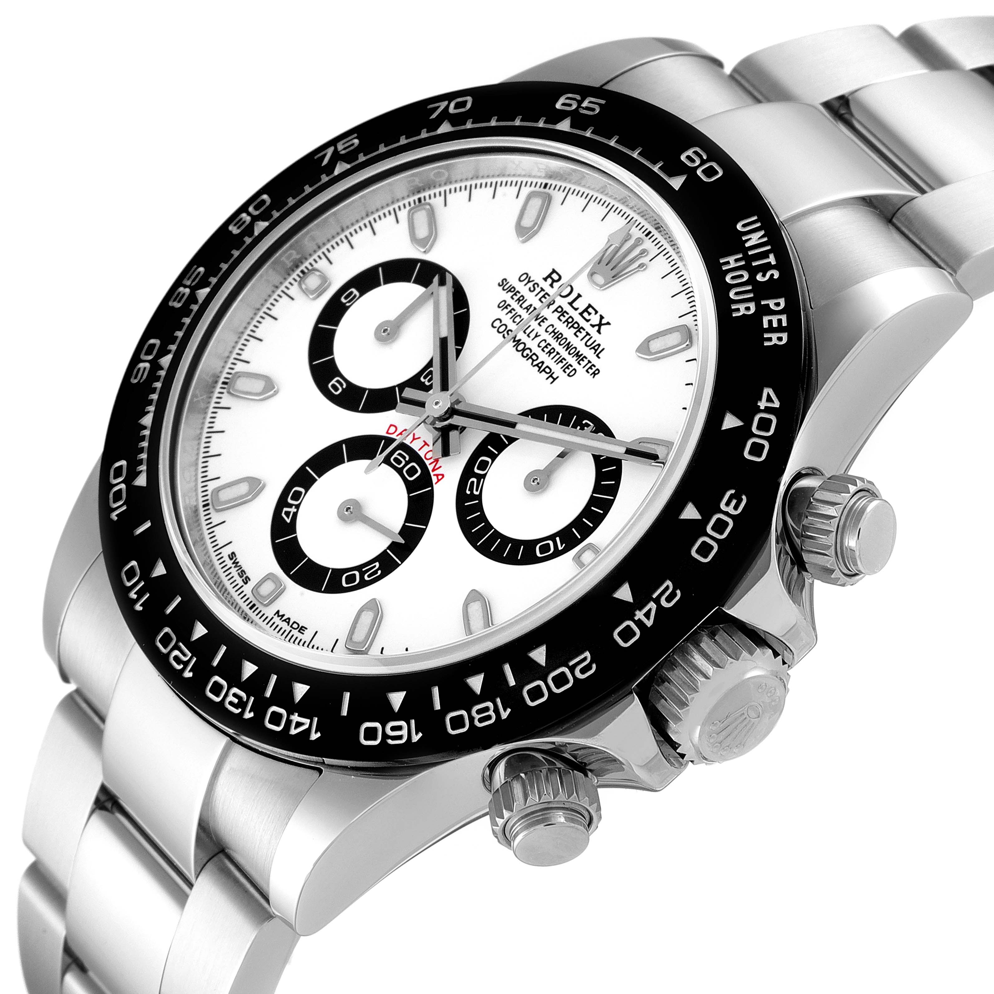 The image shows a close-up of a Rolex Daytona 116500 Men's Stainless Steel White Dial 116500 Men's Stainless Steel White Dial watch, capturing the face, bezel, and crown from an angled side view.
