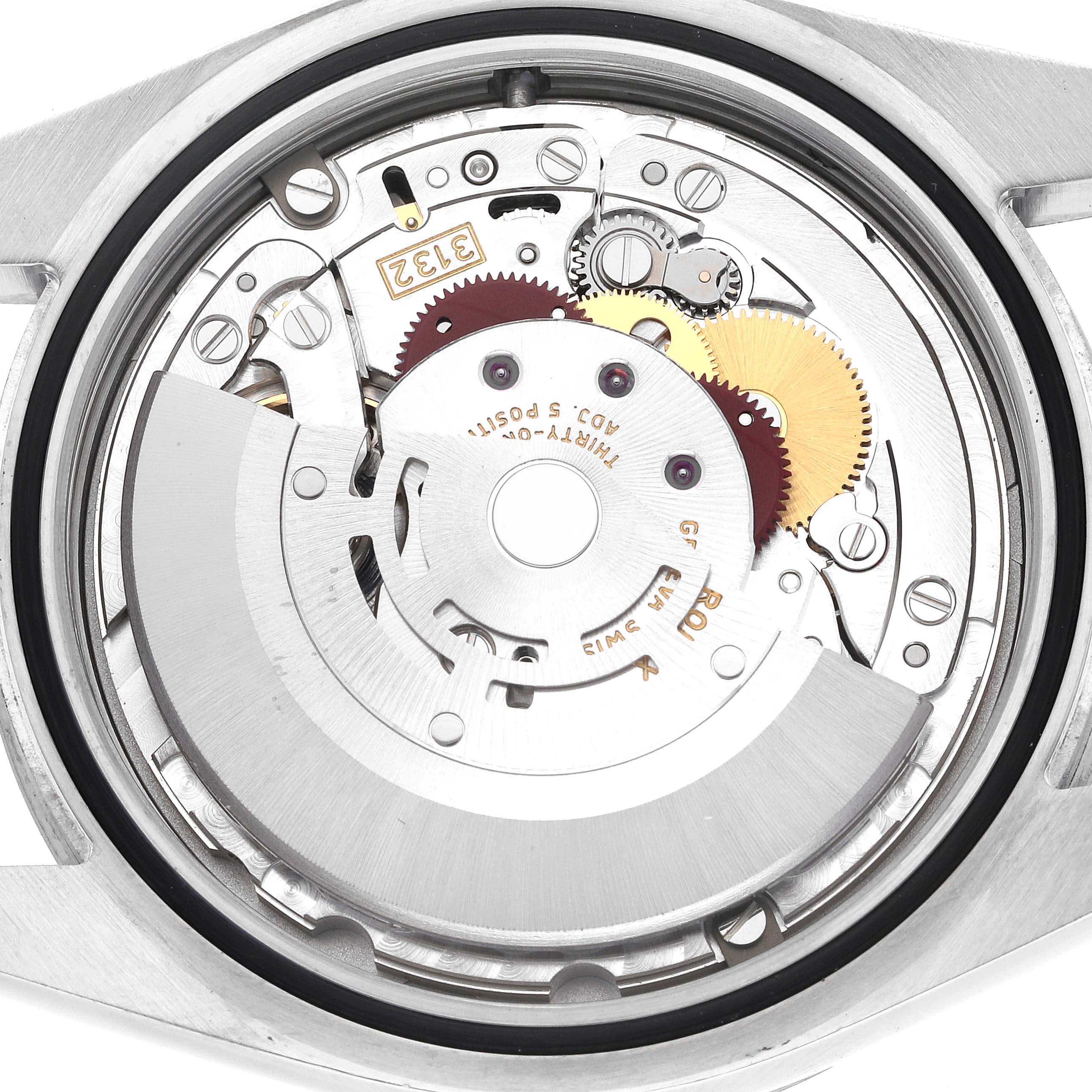 This image shows the intricate internal mechanism of a Rolex Explorer 214270 Men's Stainless Steel Black Dial 214270 Men's Stainless Steel Black Dial watch viewed from the back.