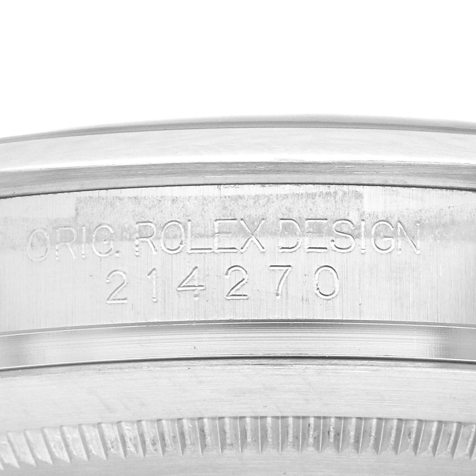This image shows a close-up of the engraved side of the bezel of a Rolex Explorer 214270 Men's Stainless Steel Black Dial 214270 Men's Stainless Steel Black Dial model, displaying the design and model number 214270.