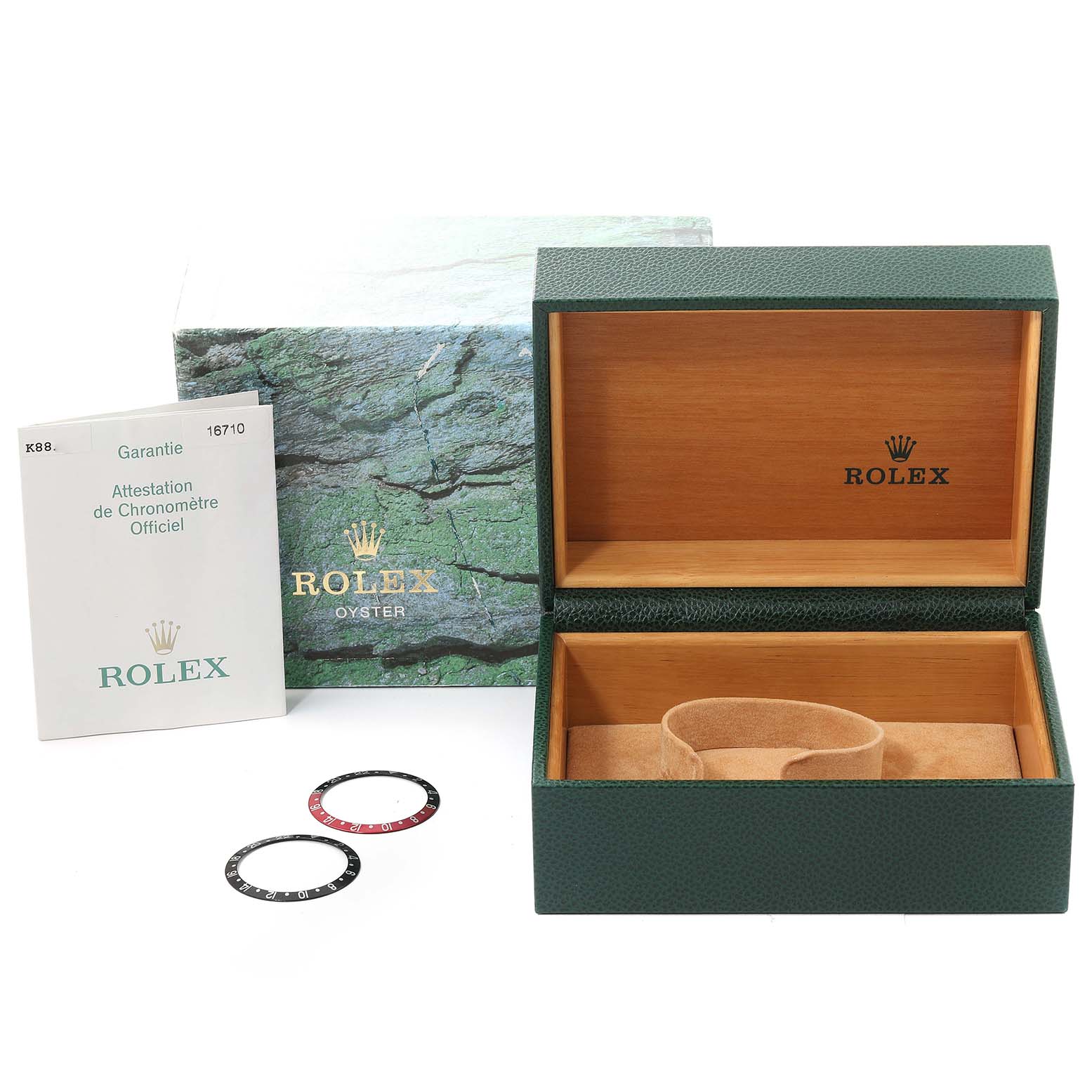 The image shows a Rolex GMT-Master 16710 Men's Stainless Steel Black Dial 16710 Men's Stainless Steel Black Dial watch box, official documentation, and two bezel inserts.