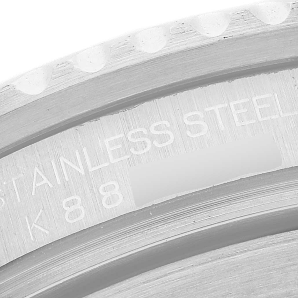 The image shows a close-up angle of the case back engraving on a Rolex GMT-Master 16710 Men's Stainless Steel Black Dial 16710 Men's Stainless Steel Black Dial, highlighting the “Stainless Steel” text.