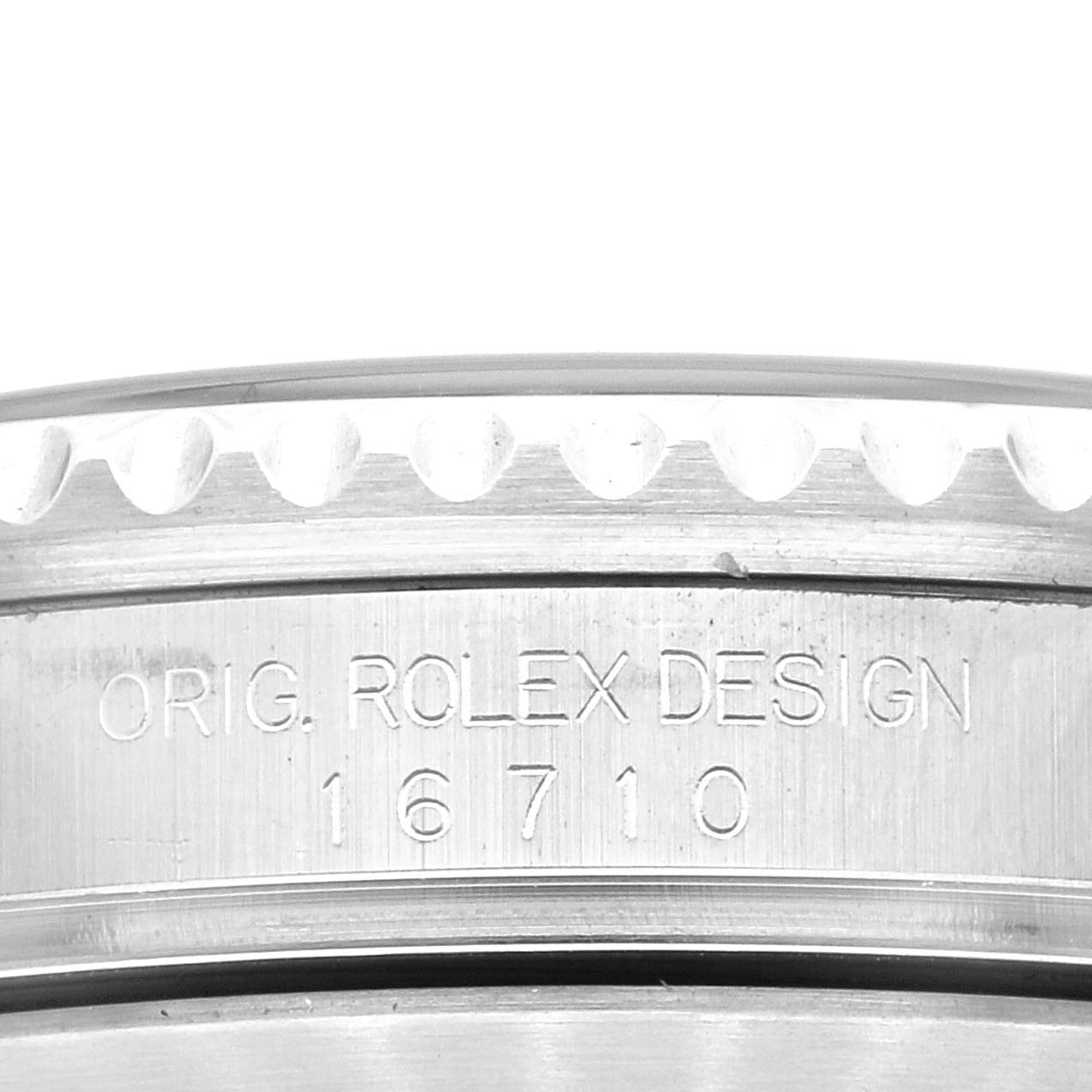 This is a close-up shot of the case side of a Rolex GMT-Master 16710 Men
s Stainless Steel Black Dial 16710 Men
s Stainless Steel Black Dial, showing the model number "16710" and "ORIG. ROLEX DESIGN" engraving.