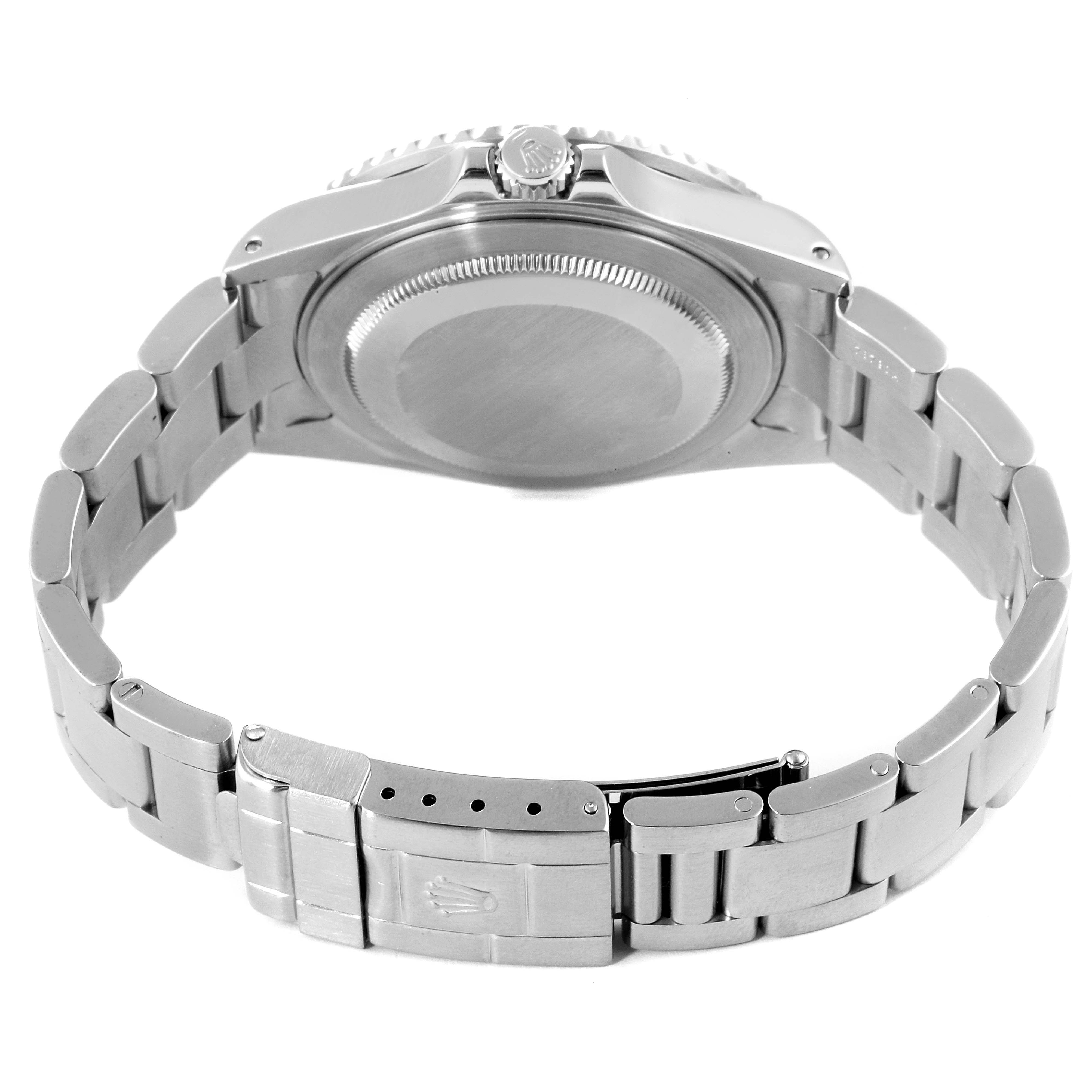 This image shows the back casing and bracelet of a Rolex GMT-Master 16710 Men
s Stainless Steel Black Dial 16710 Men
s Stainless Steel Black Dial watch, viewed from the rear.