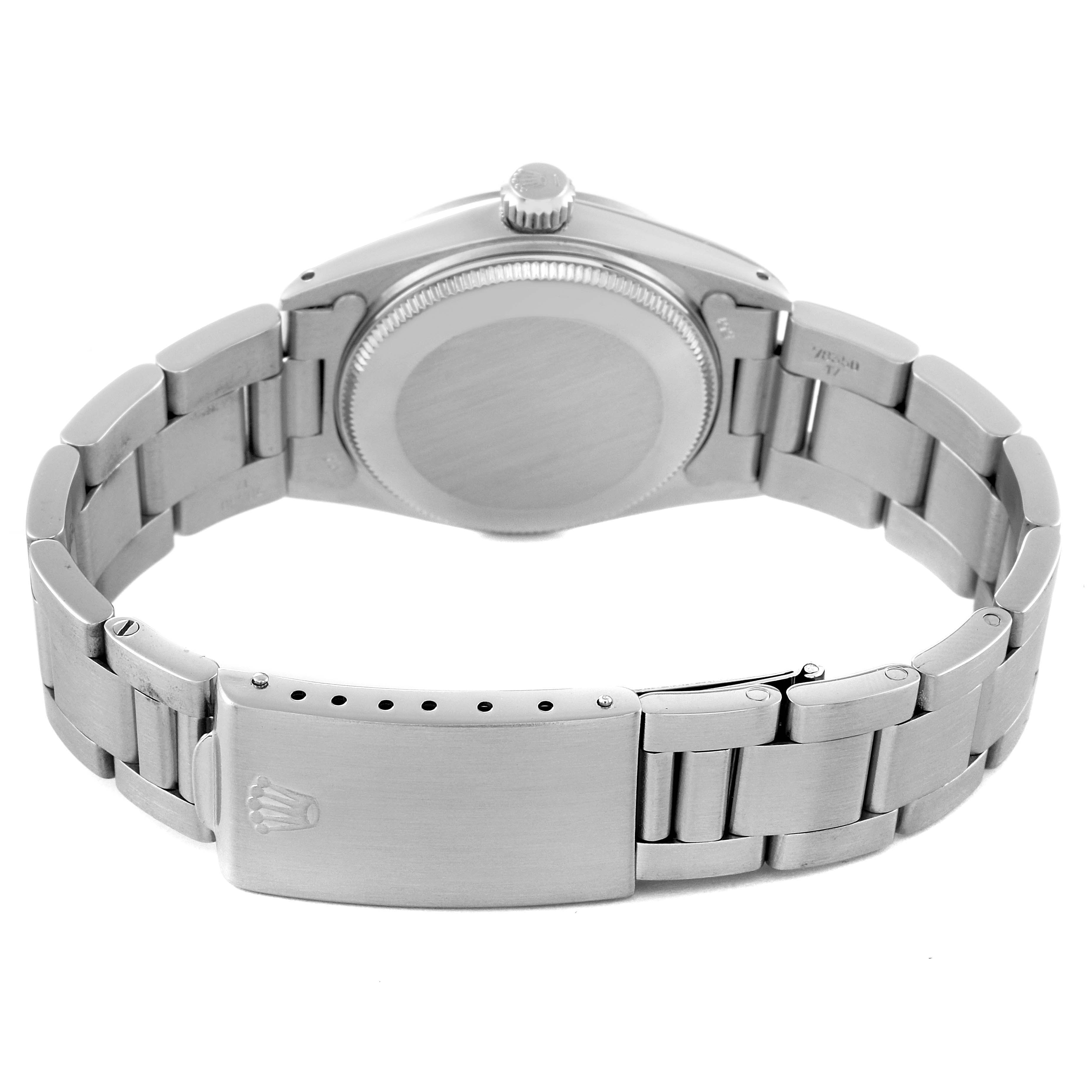 This image shows the backside and clasp of a Rolex Mid-Size 6824 Women's Stainless Steel Grey Dial 6824 Women's Stainless Steel Grey Dial watch.