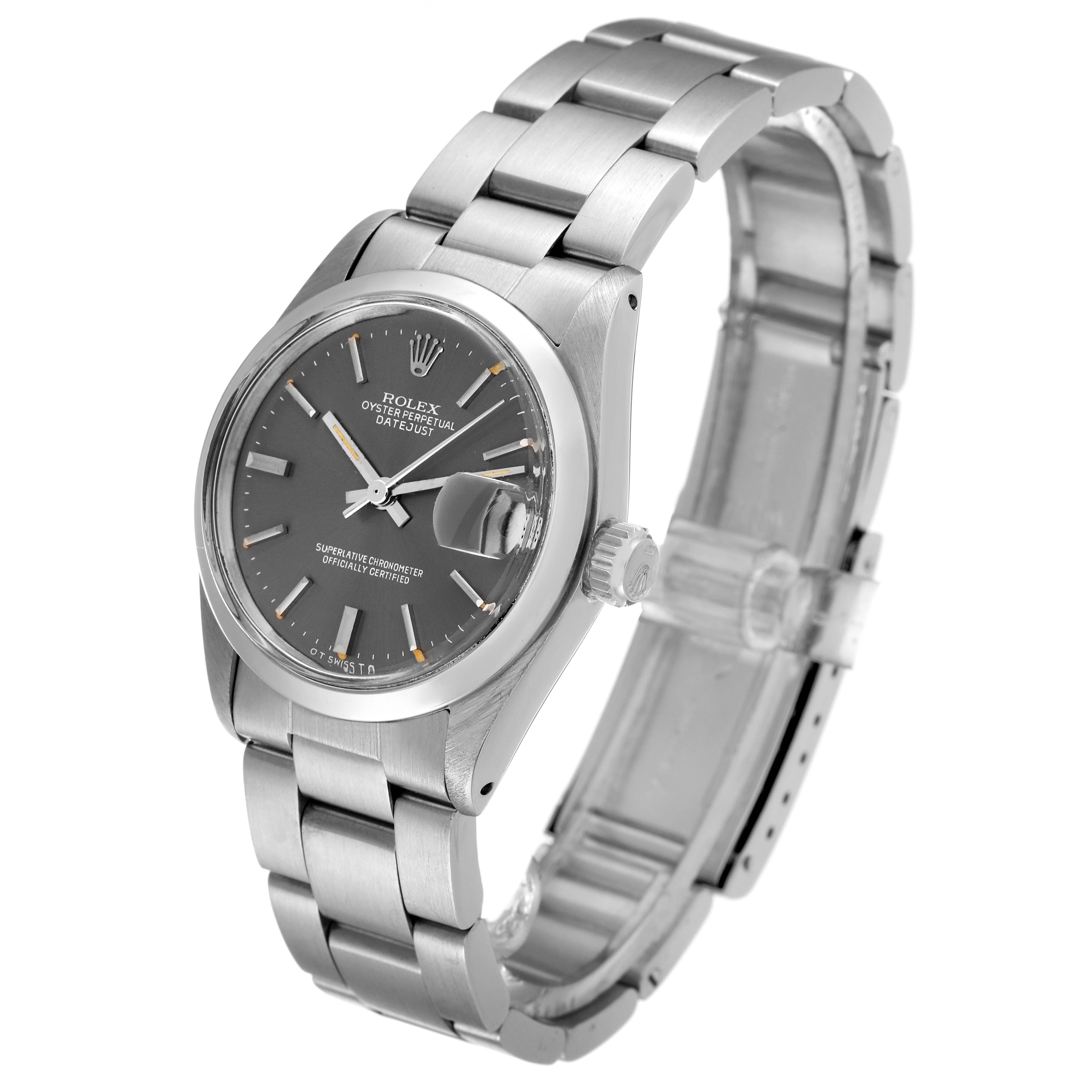 The image shows a side view of a Rolex Mid-Size 6824 Women's Stainless Steel Grey Dial 6824 Women's Stainless Steel Grey Dial Oyster Perpetual Datejust watch, displaying the face, band, and crown.